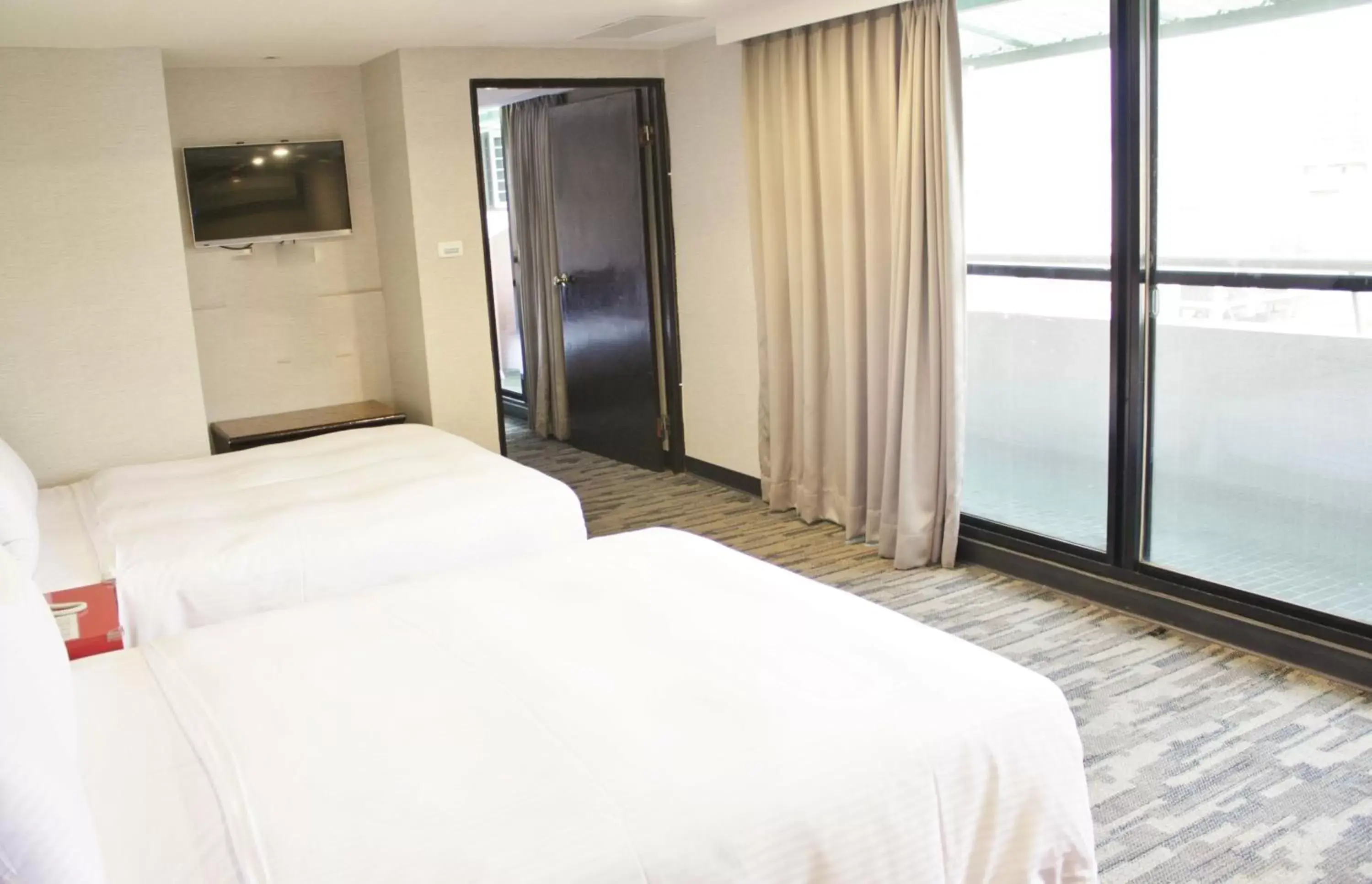 Photo of the whole room, Bed in LIHO Hotel Tainan