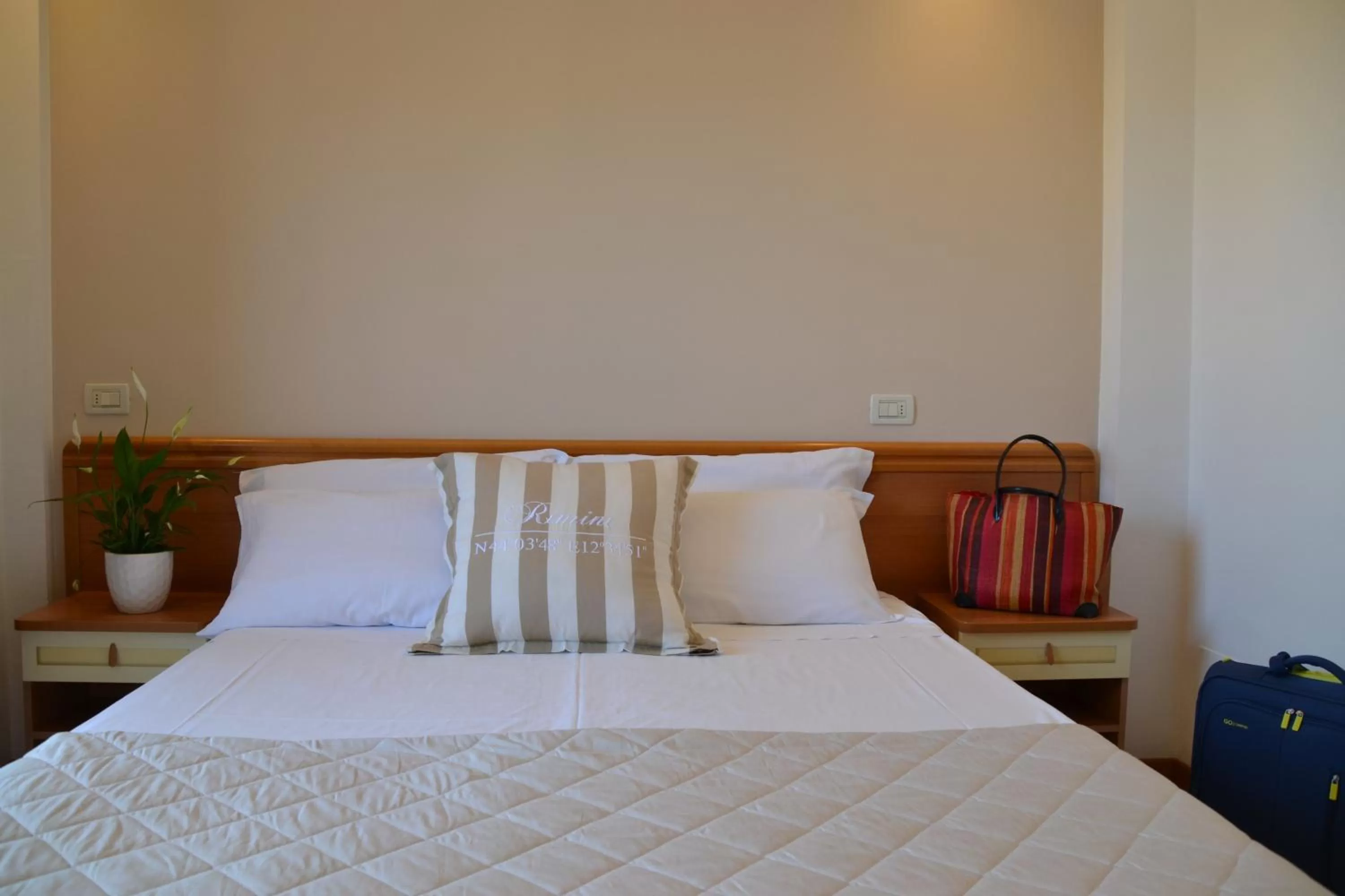 Bed in Hotel Apogeo - Breakfast Experience