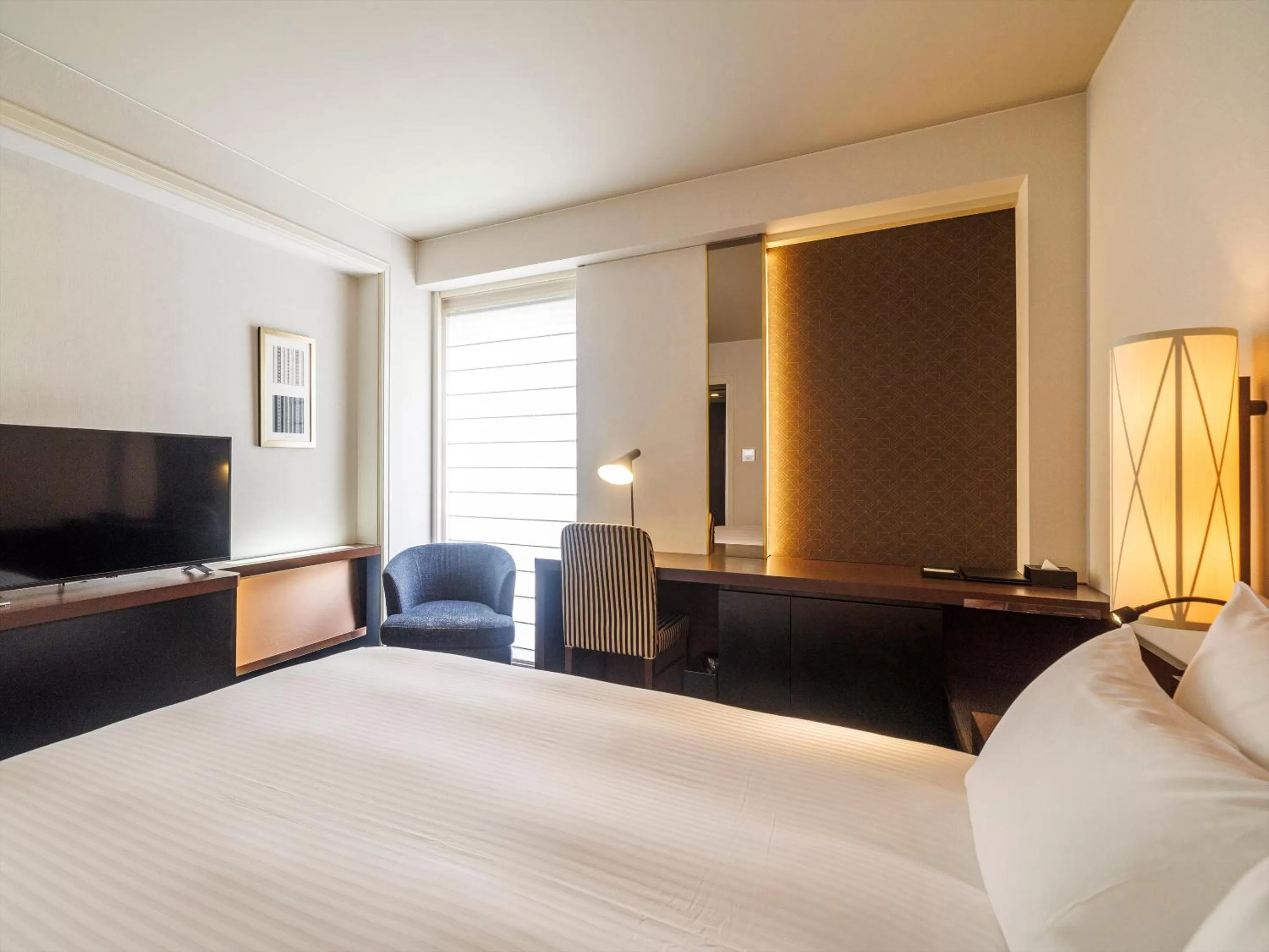 Bed in JR Kyushu Hotel Blossom Fukuoka