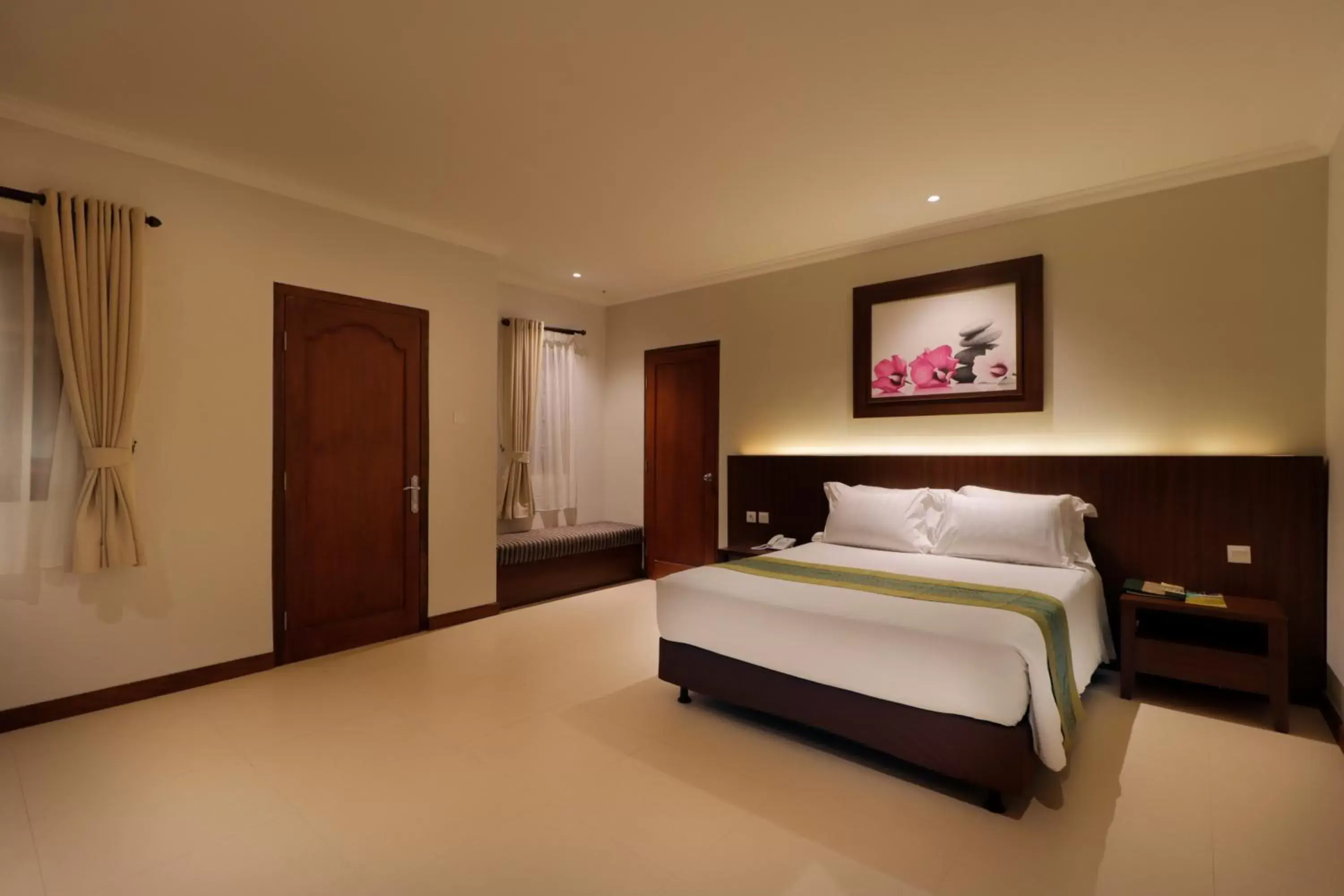 Bed in Adi Dharma Hotel Legian