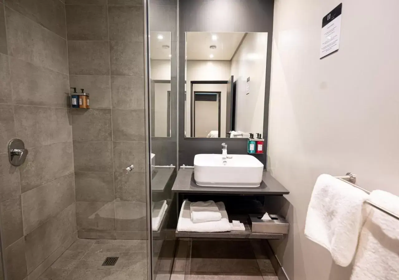 Bathroom in The Catalyst Apartment Hotel by NEWMARK