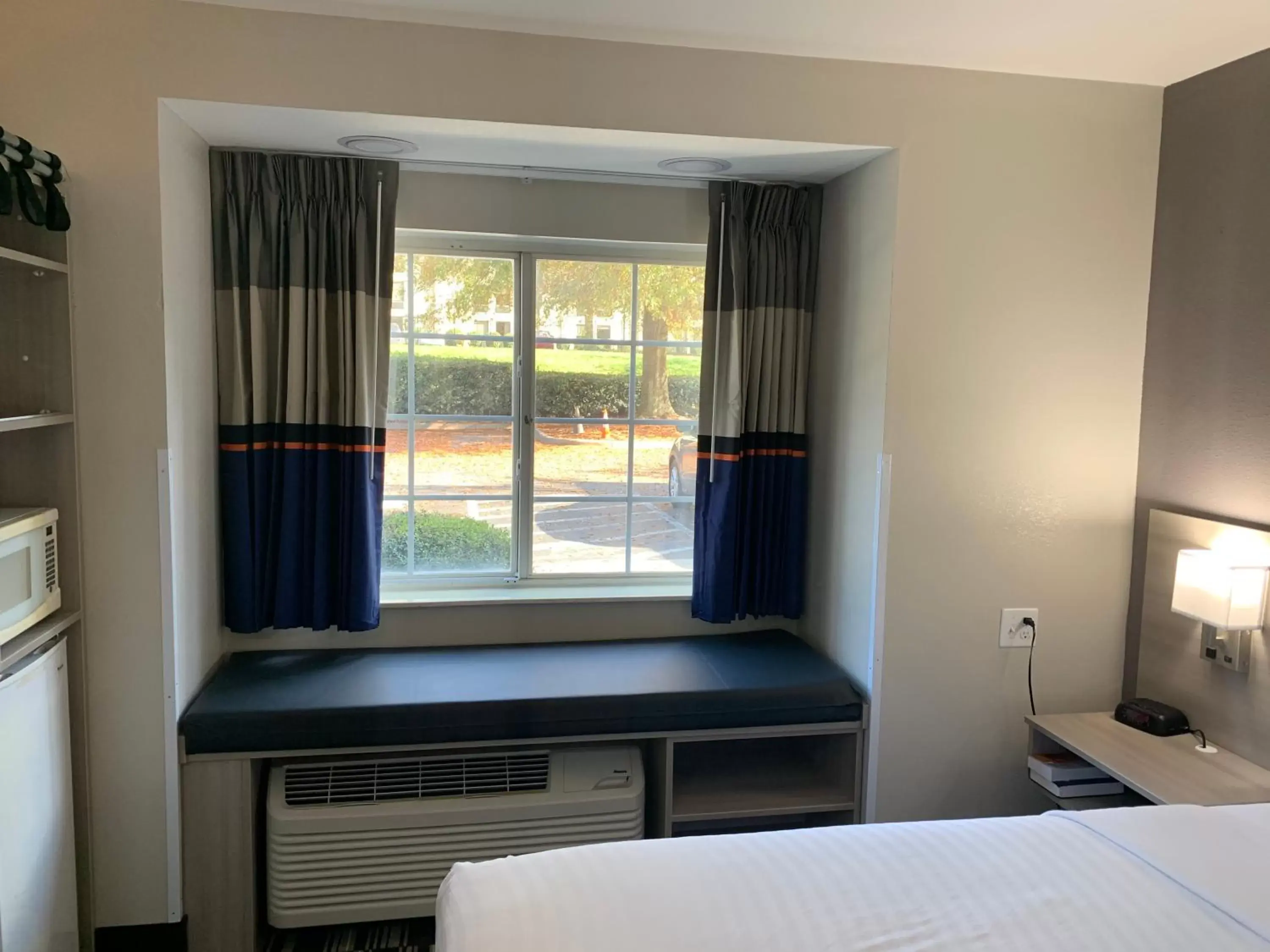 Bed in Microtel Inn by Wyndham Charlotte Airport