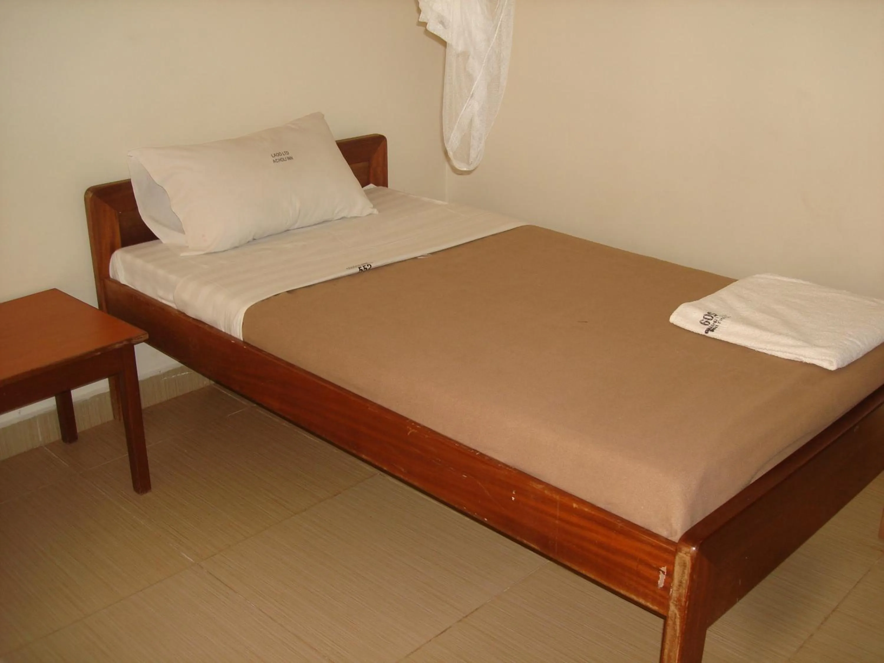 Bedroom in Acholi Inn