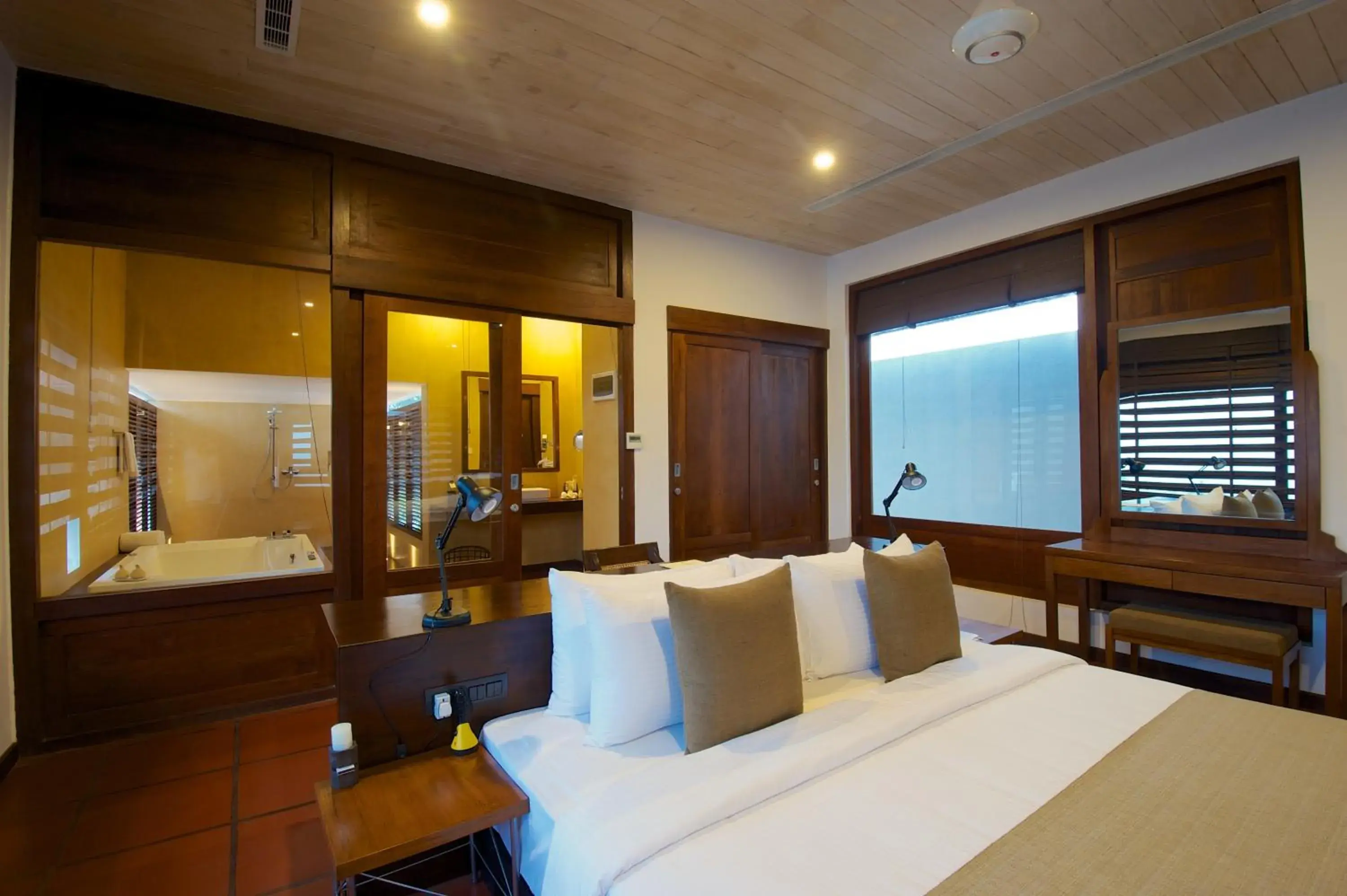 Bed in Jetwing Thalahena Villas