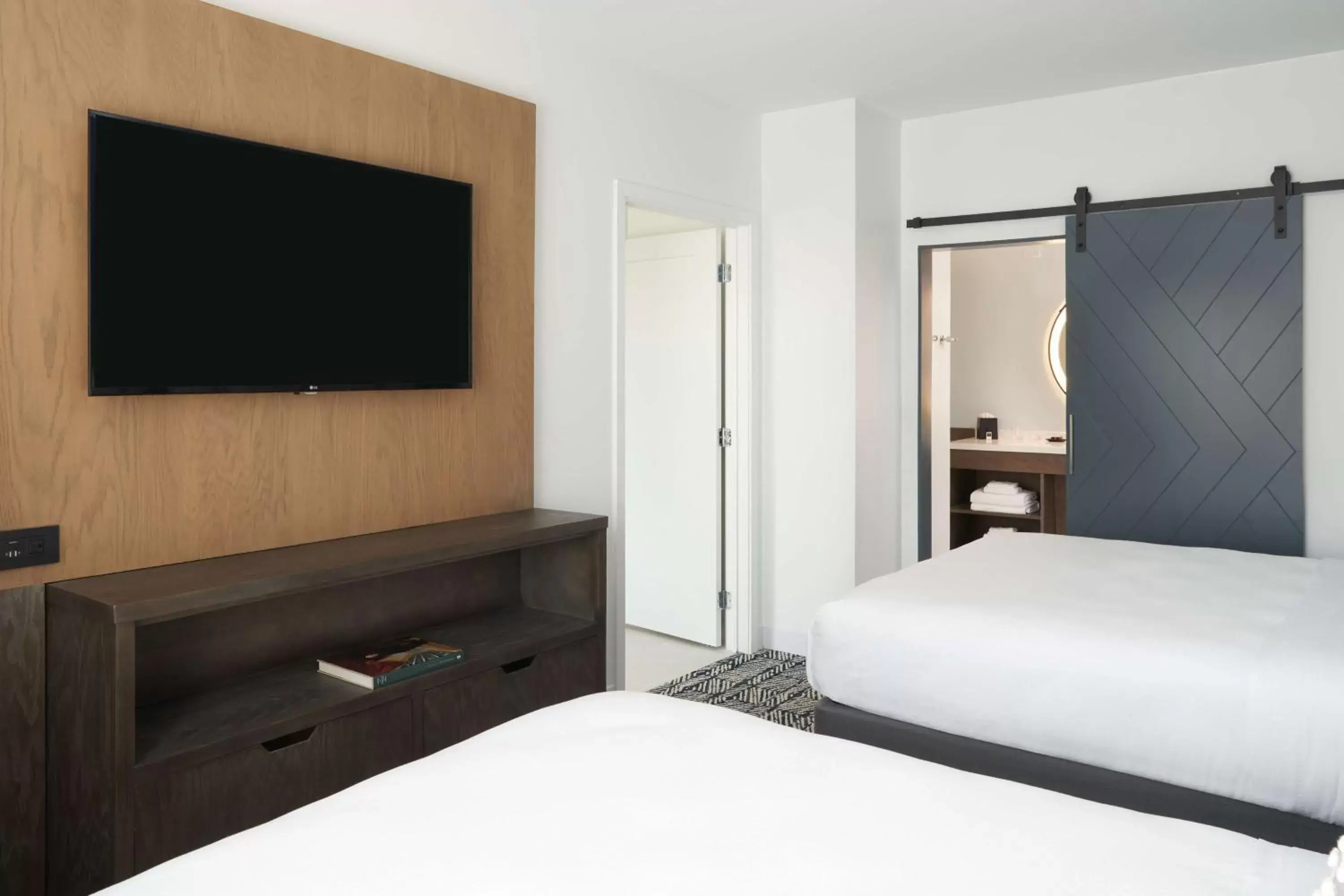 Bedroom, TV/Entertainment Center in The Chifley Houston, Tapestry Collection by Hilton