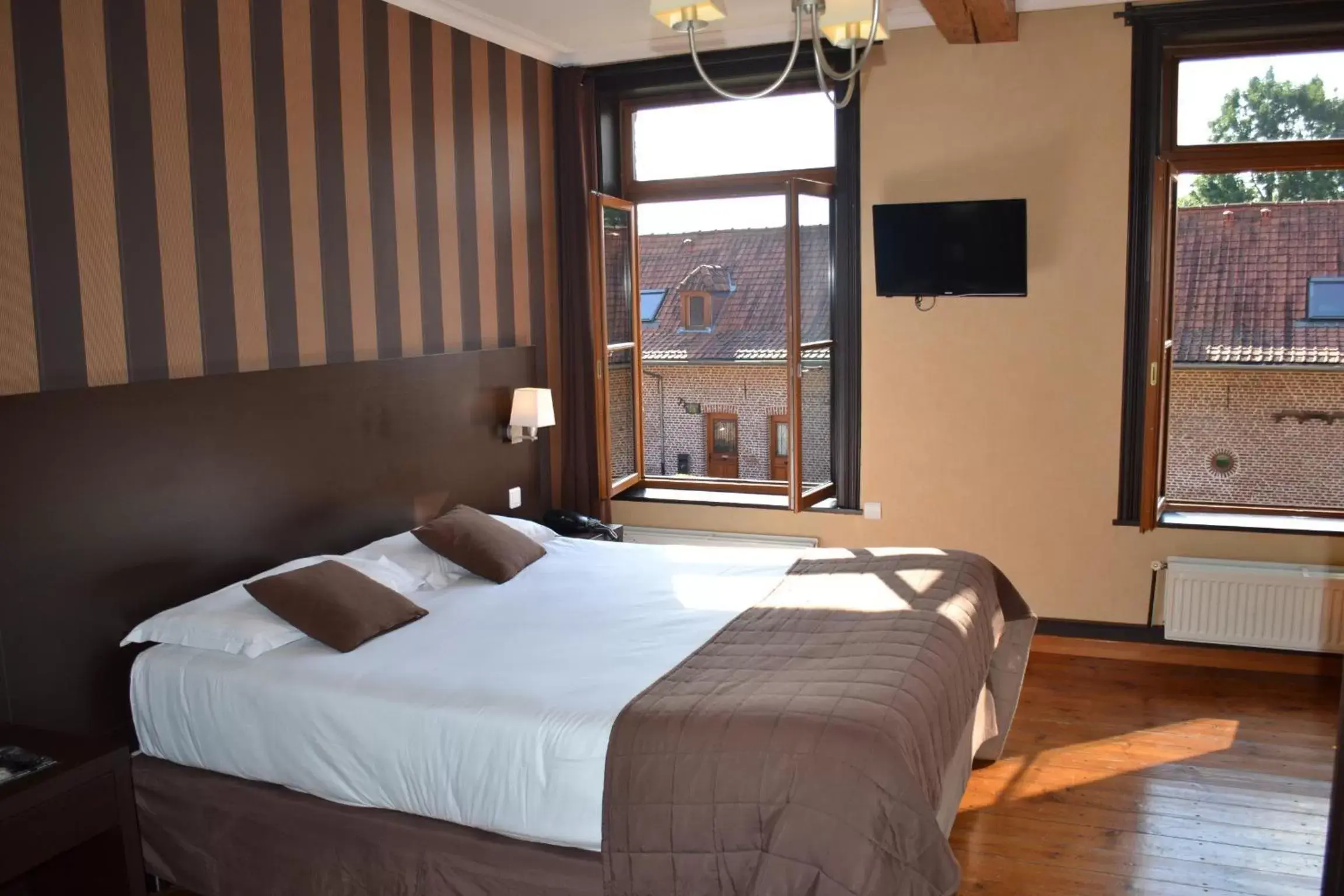 Triple Room in Le Domaine des Cigognes Triple Room in Le Domaine des Cigognes