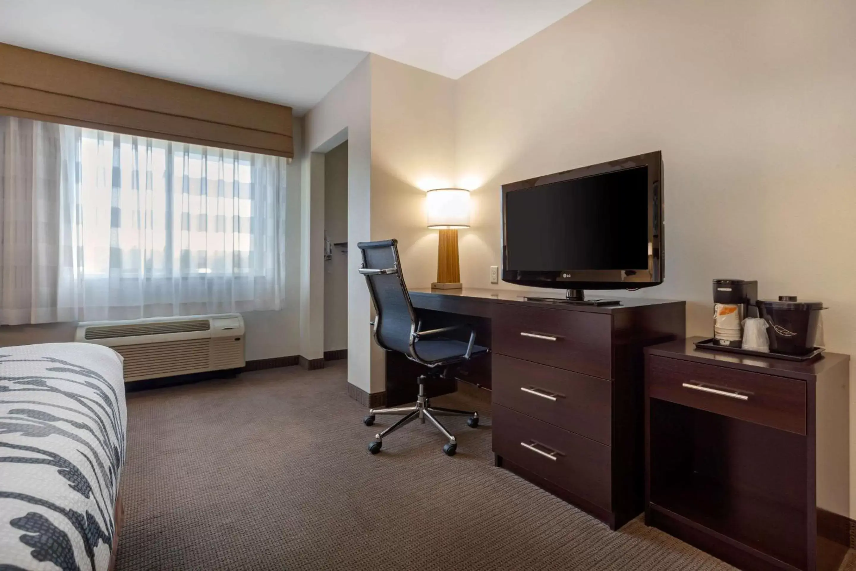 Photo of the whole room, TV/Entertainment Center in Sleep Inn & Suites Bismarck I-94