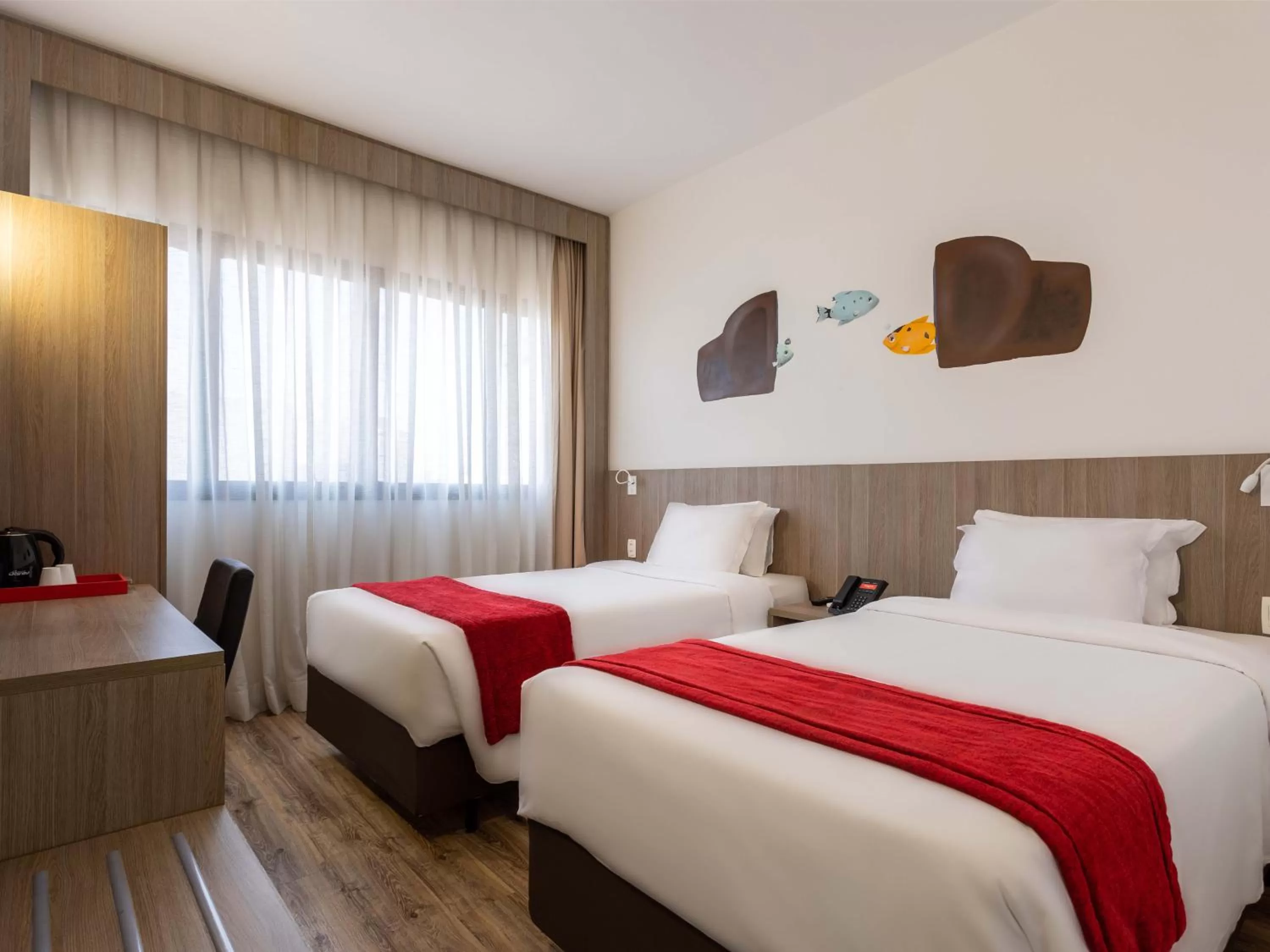 Bed in Ramada Encore by Wyndham São Paulo Osasco