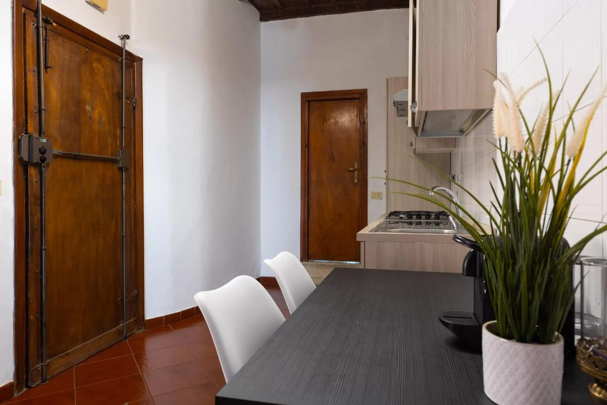 Kitchen or kitchenette in Navona Open Space Apartments