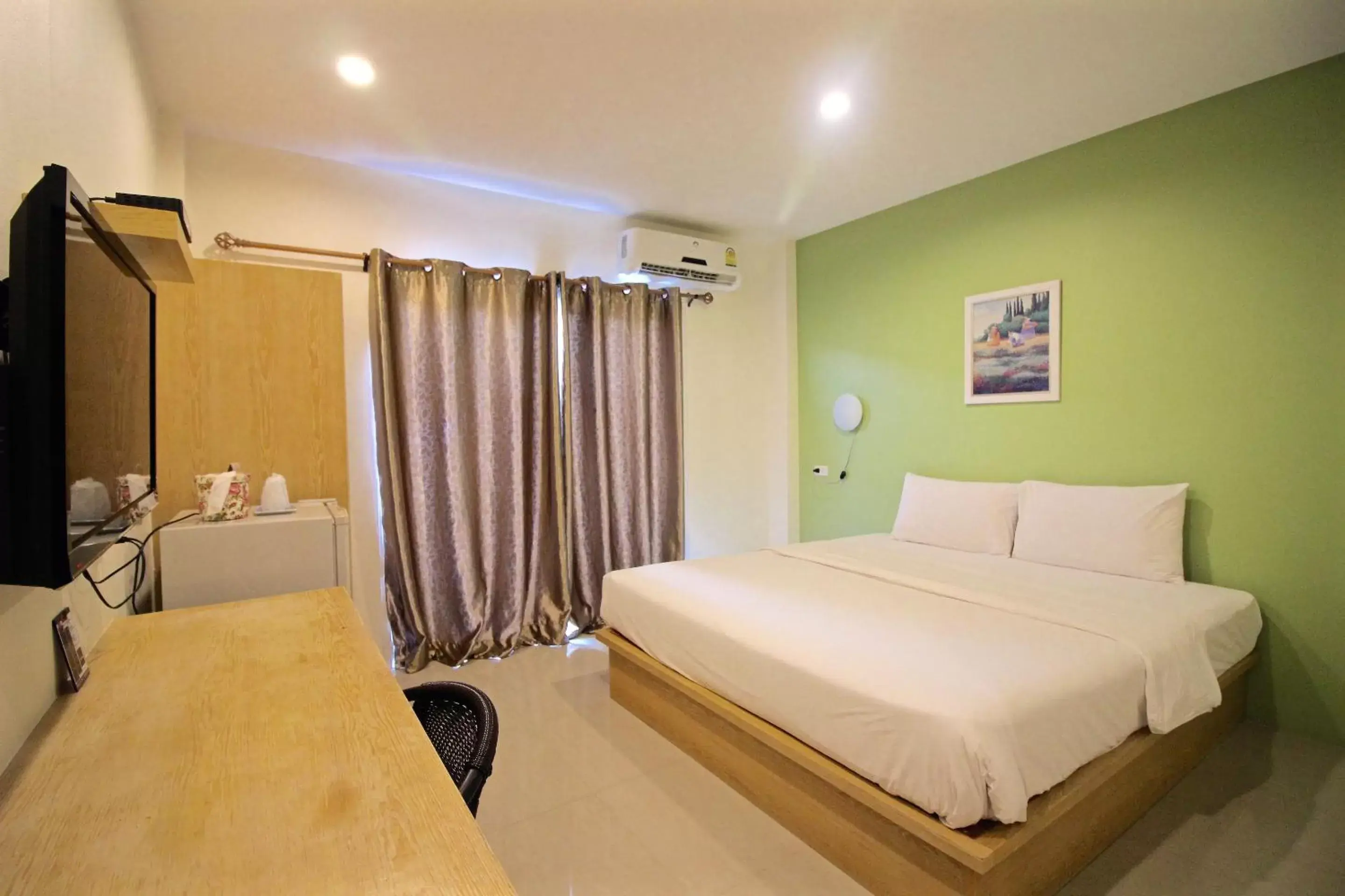 Bed in Green Apple Villa Bed in Green Apple Villa