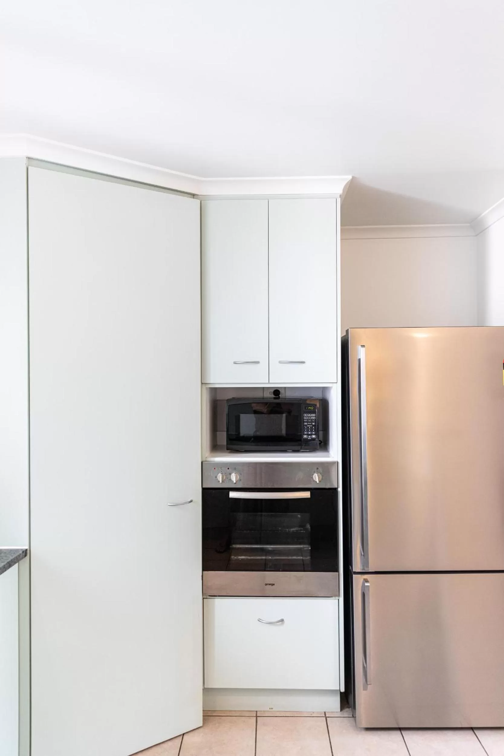 kitchen in Beaches Holiday Apartments - Official Onsite Reception & Check In