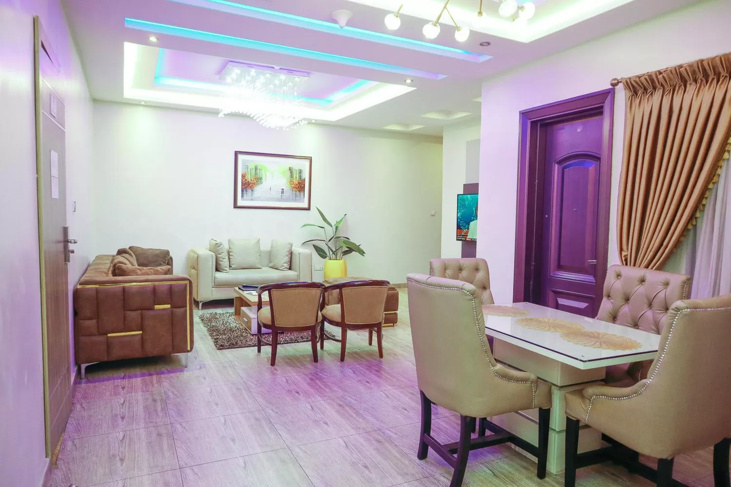 Living room in God's Touch Apartments Signature