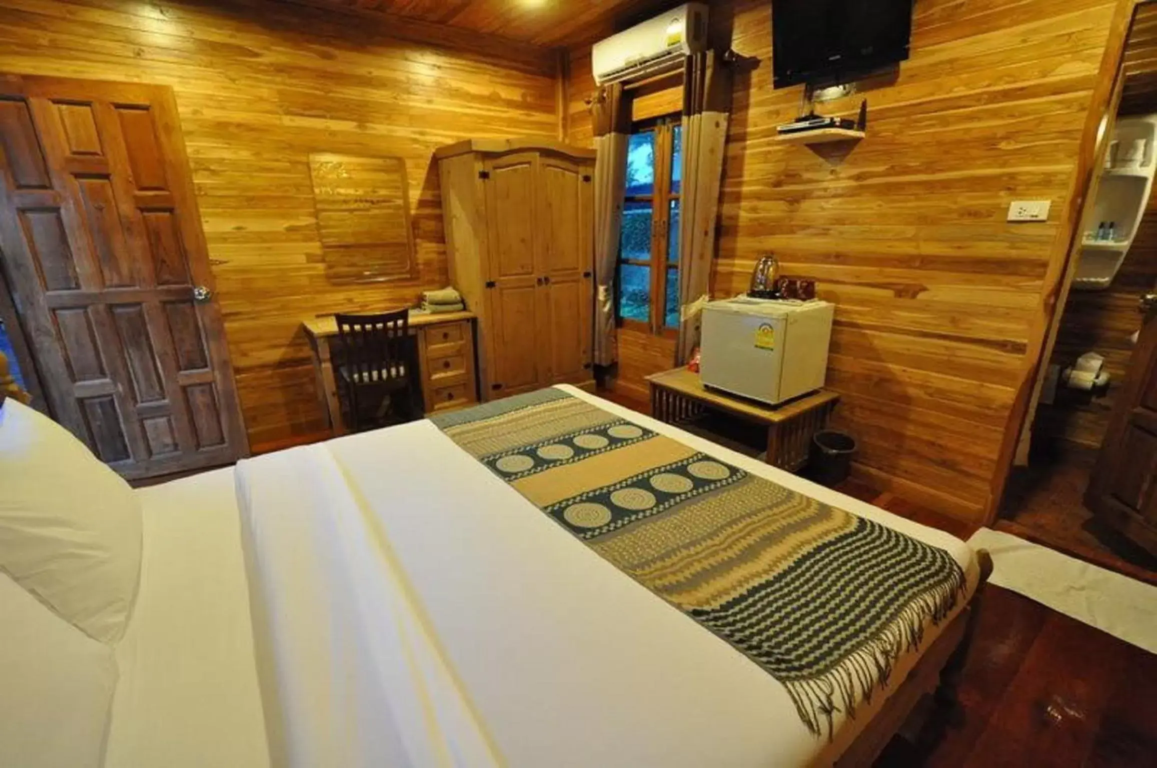 Bed in Basaya Beach Hotel & Resort
