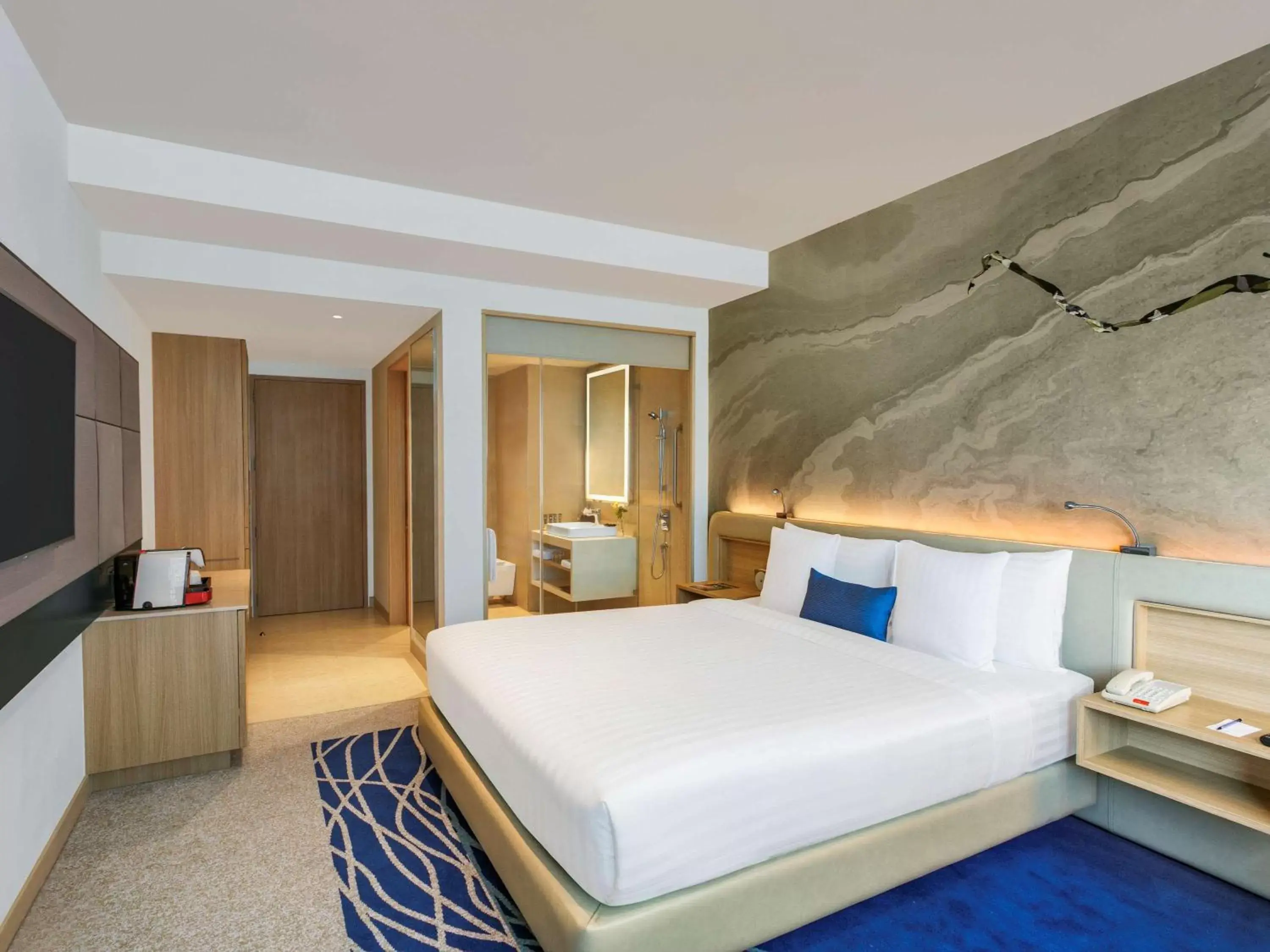 Photo of the whole room, Bed in Novotel Ahmedabad