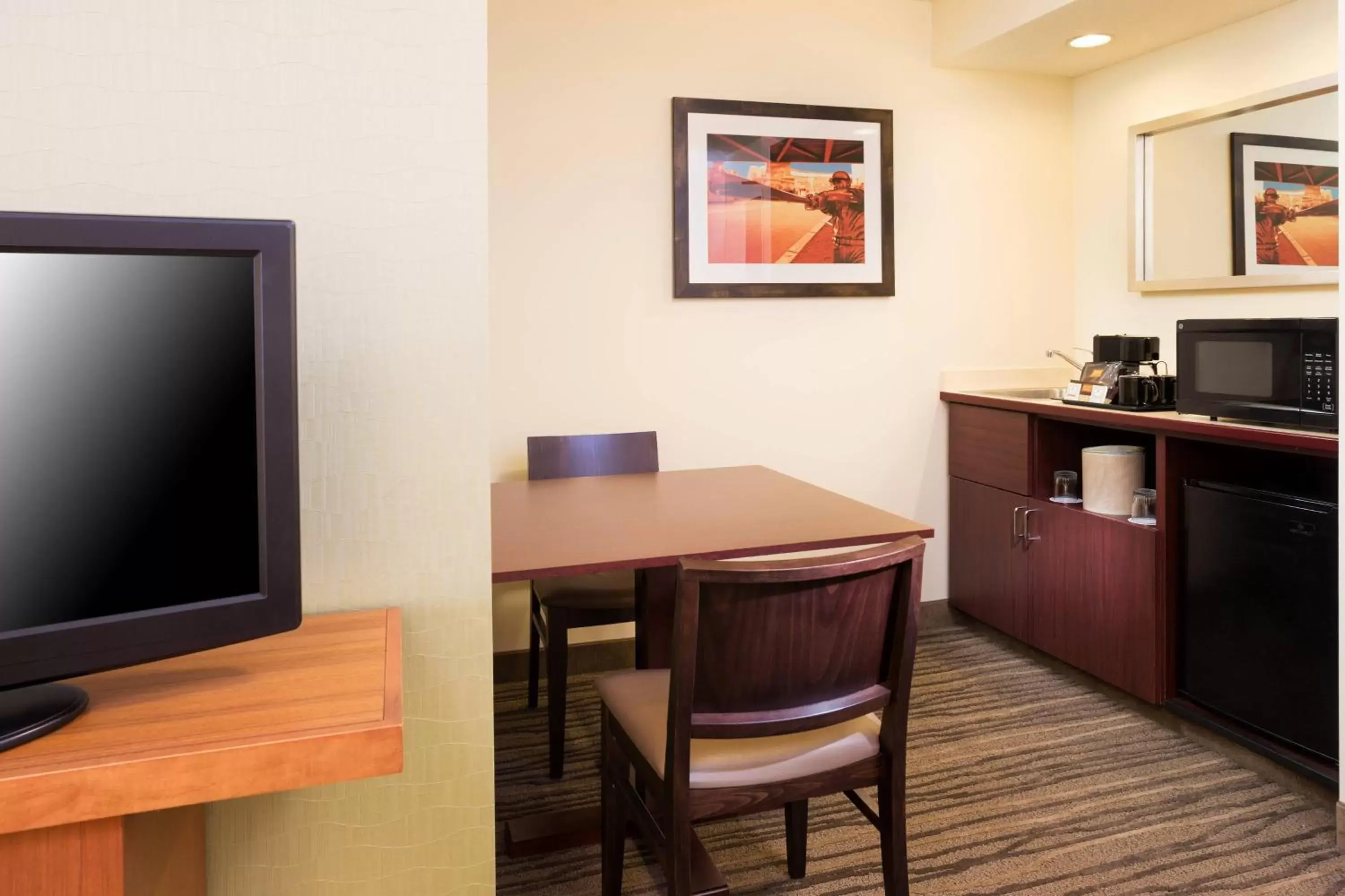 Photo of the whole room, TV/Entertainment Center in SpringHill Suites Minneapolis West St. Louis Park