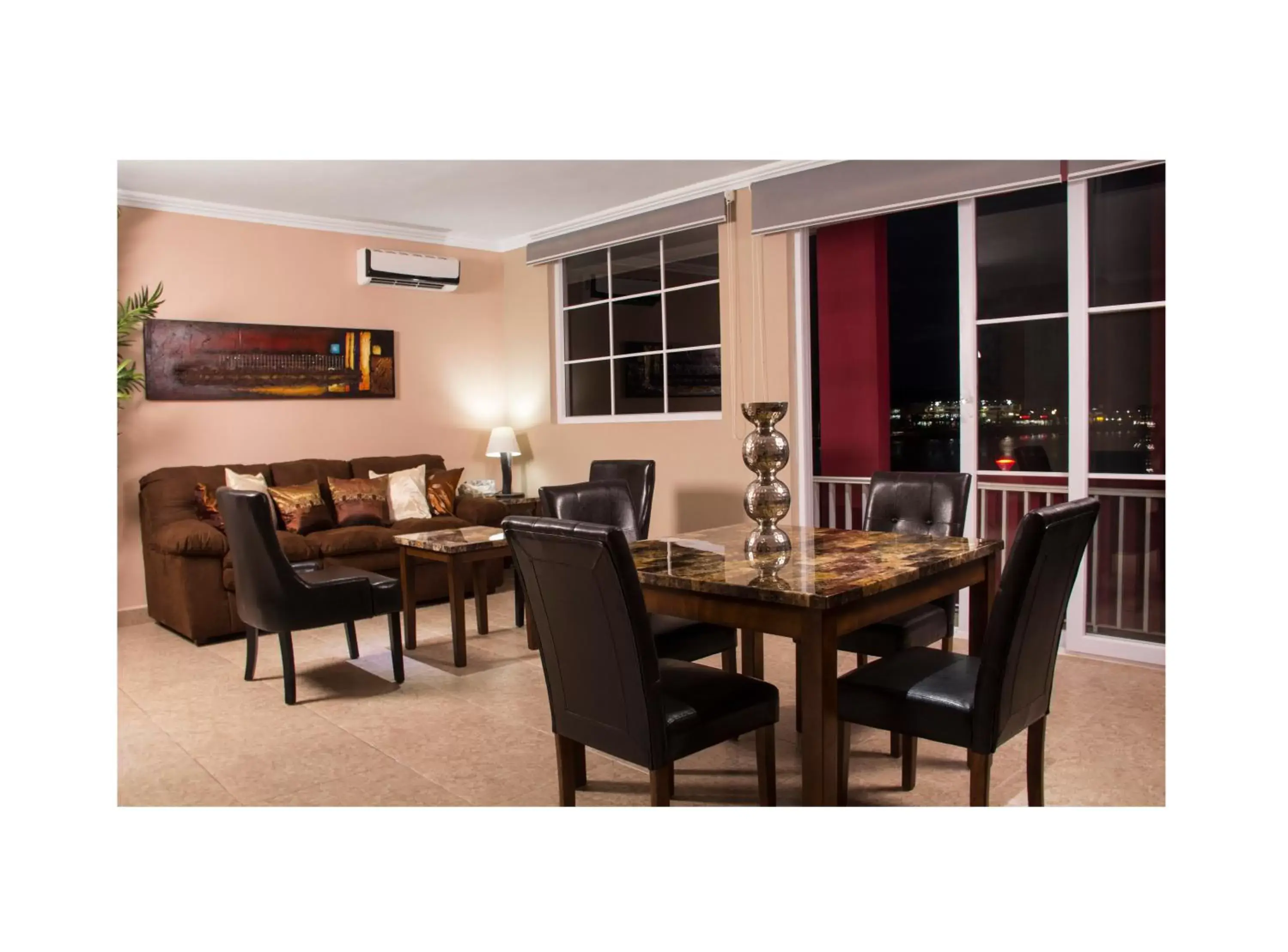 Living room in Ramada by Wyndham Tikal Isla de Flores Living room in Ramada by Wyndham Tikal Isla de Flores