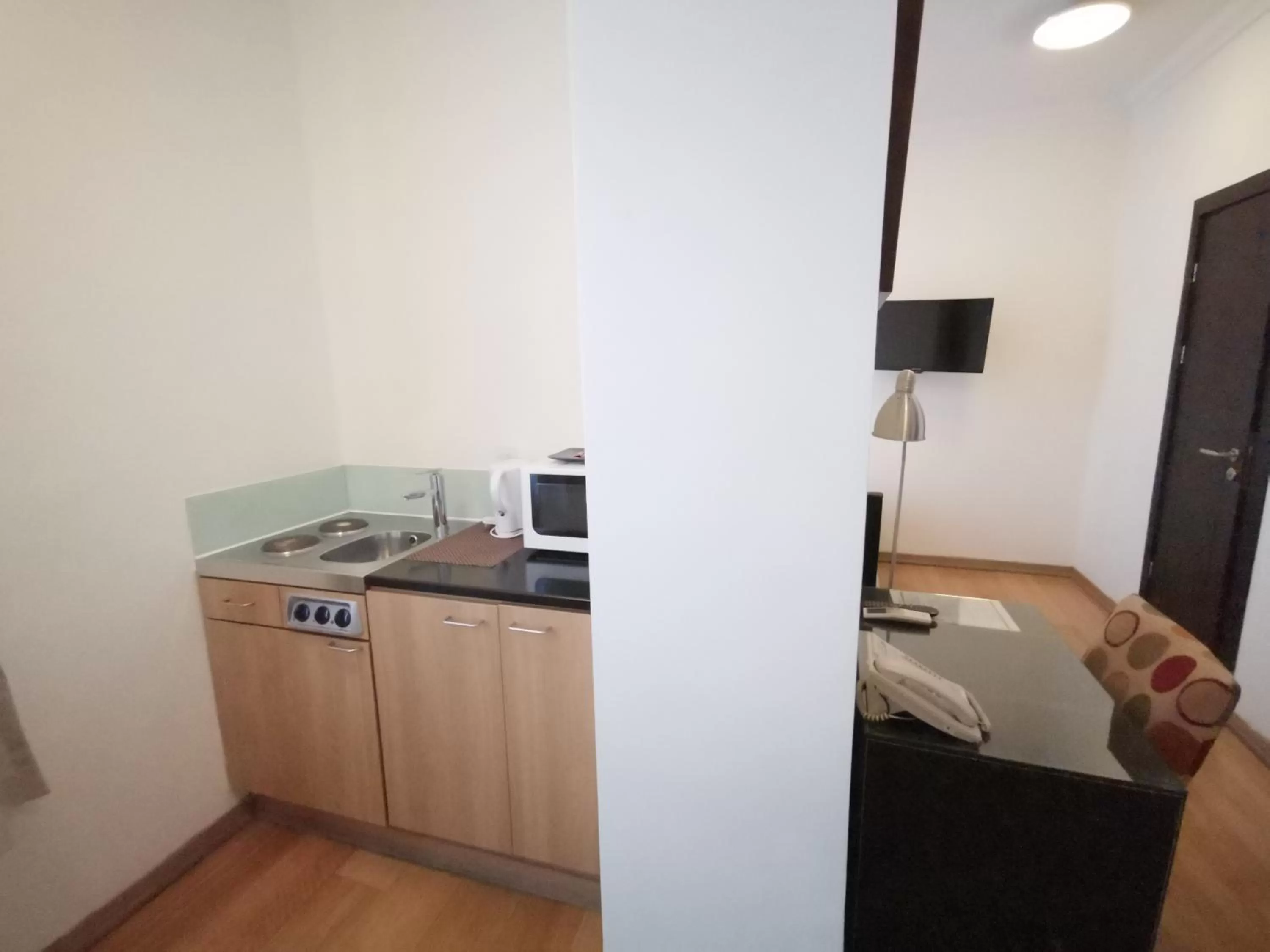 Kitchen or kitchenette in The Royale Chulan Hyde Park Hotel