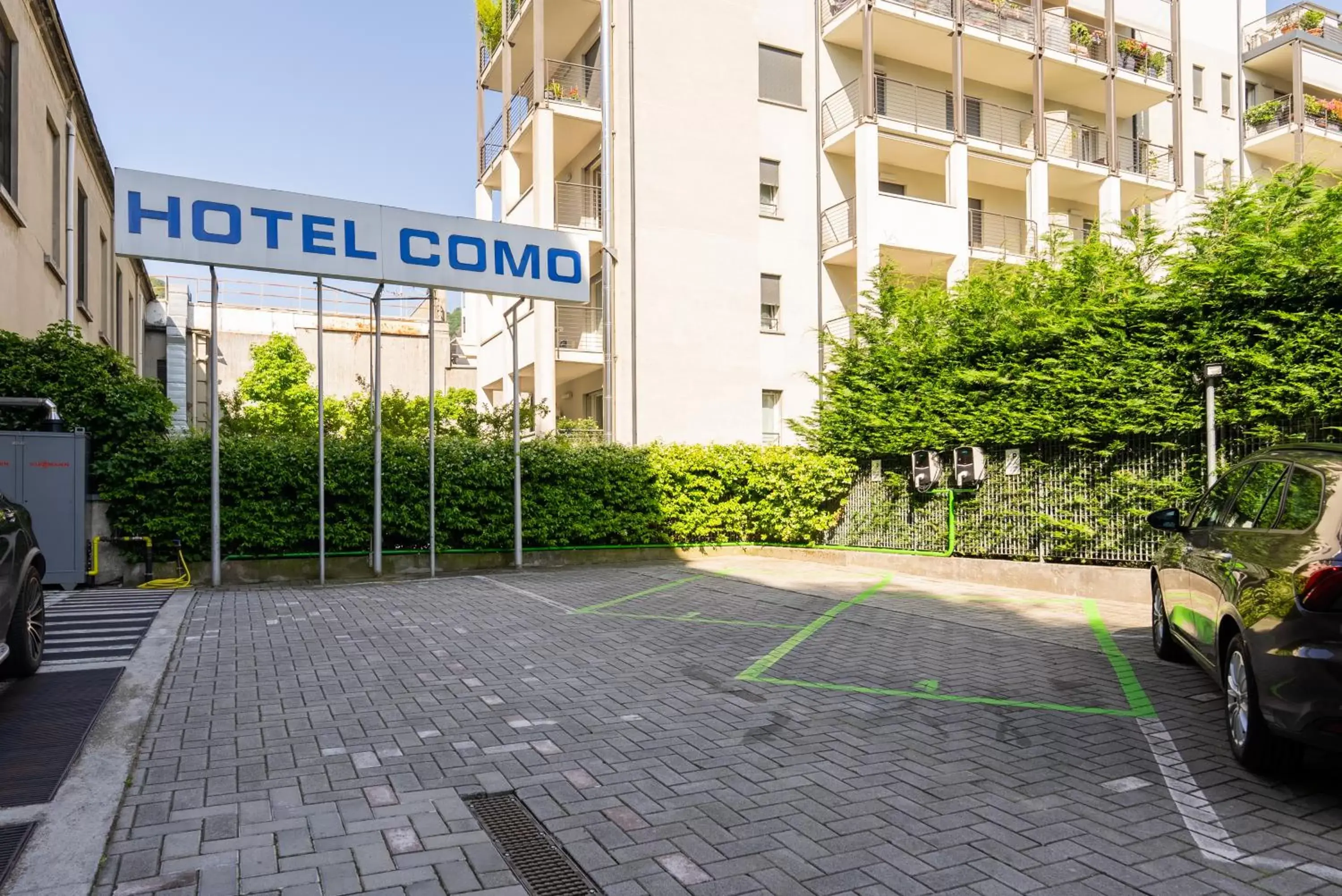 Parking, Property Building in Hotel Como