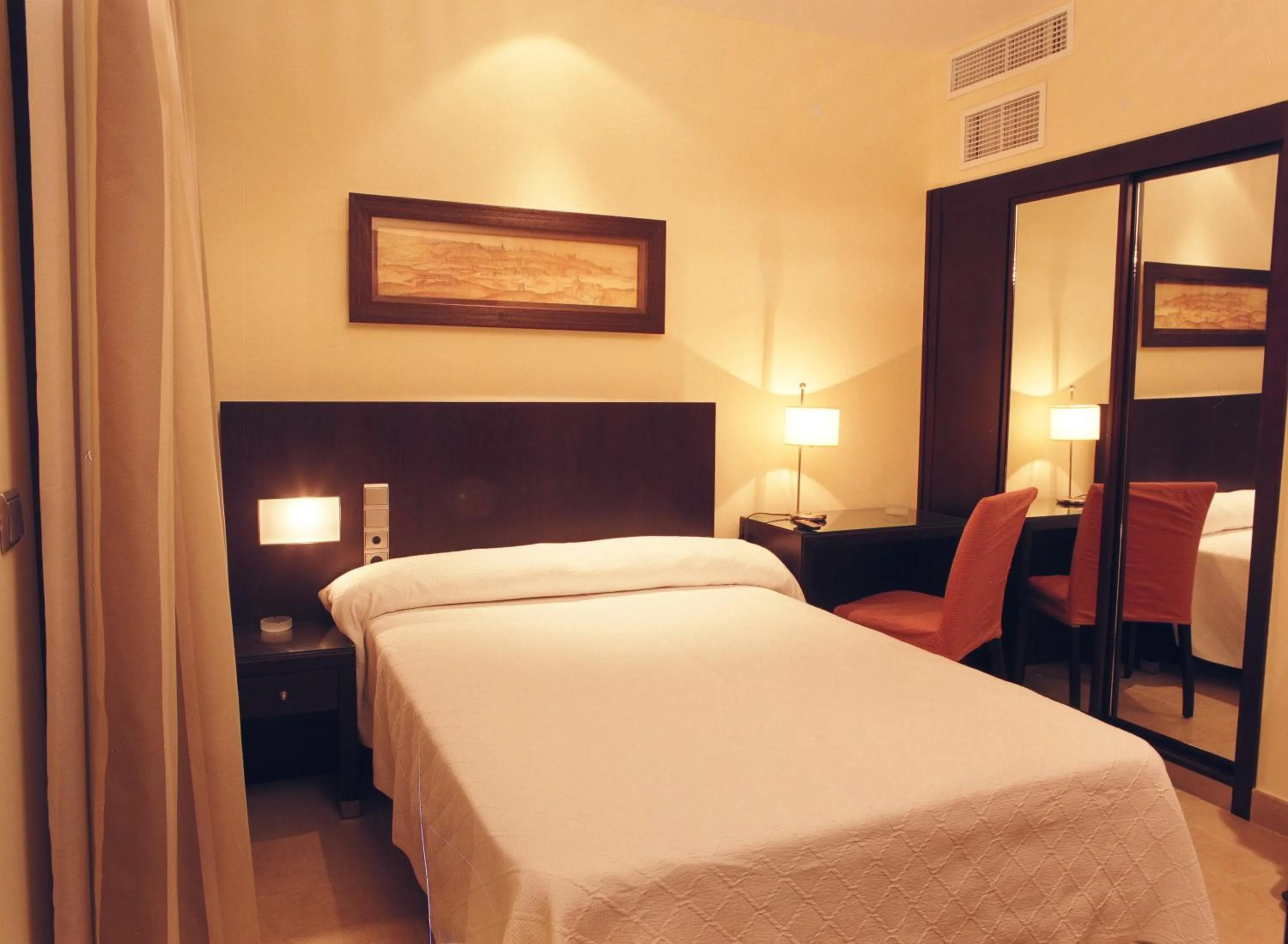 Bed in Hotel El Mesón