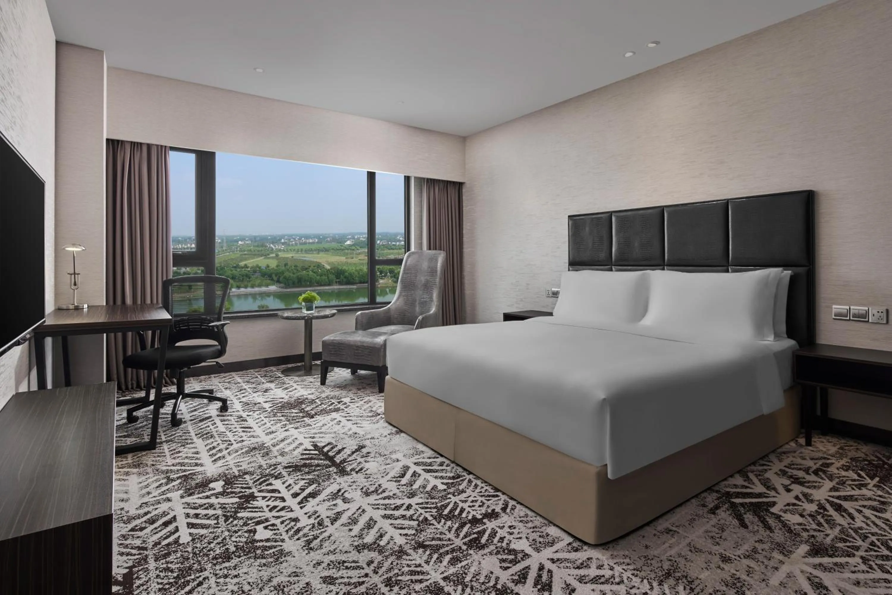 Bed in Crowne Plaza Shanghai Jinshan by IHG
