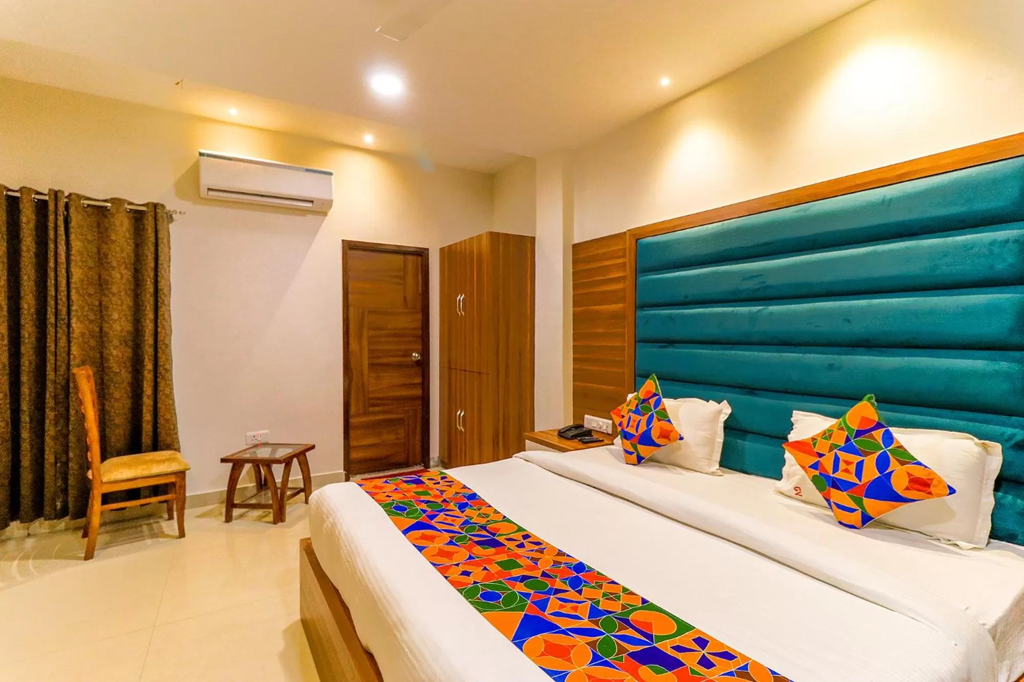 Bed in FabHotel Golden Velvet