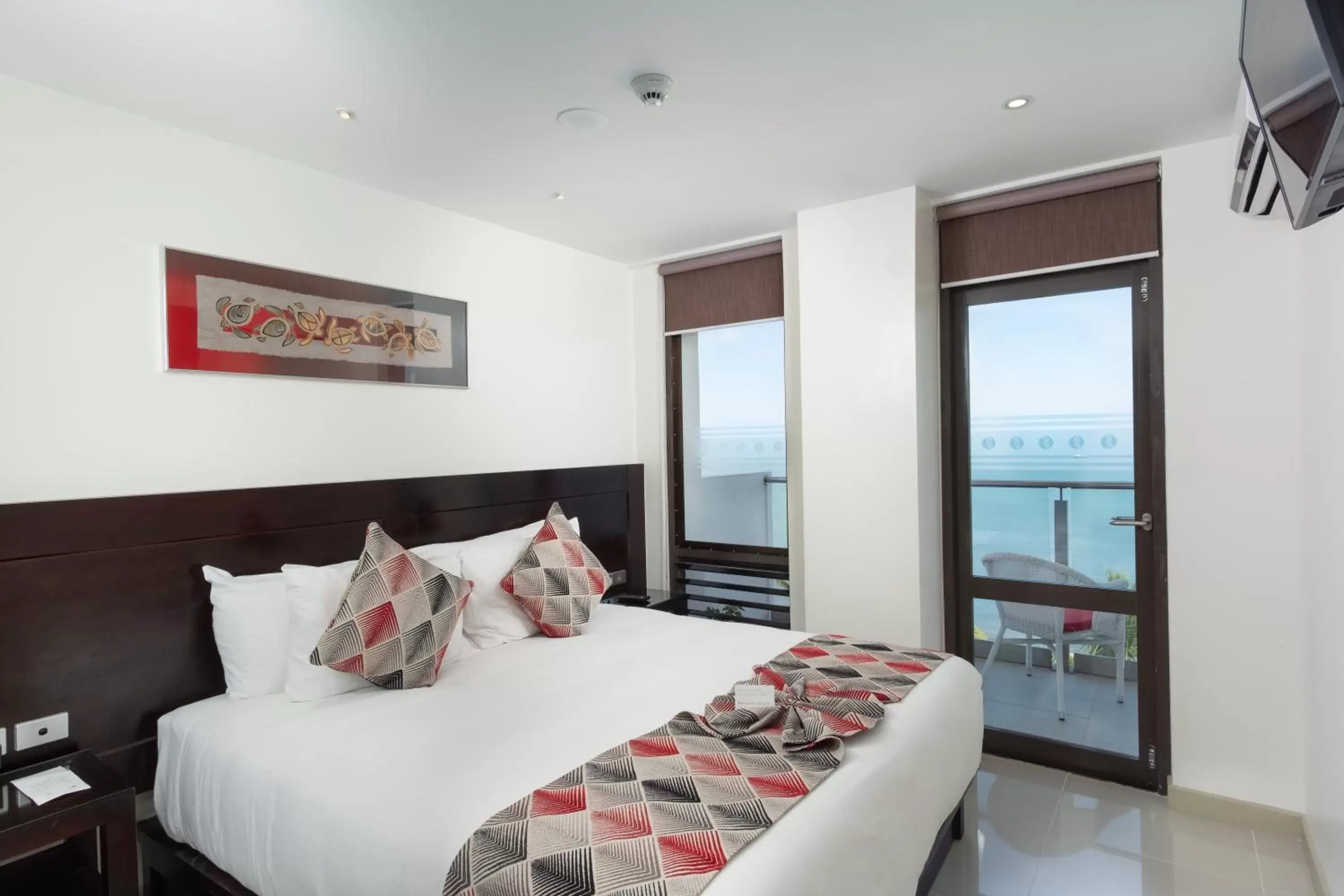 Bedroom, Bed in Ramada Suites by Wyndham Wailoaloa Beach Fiji