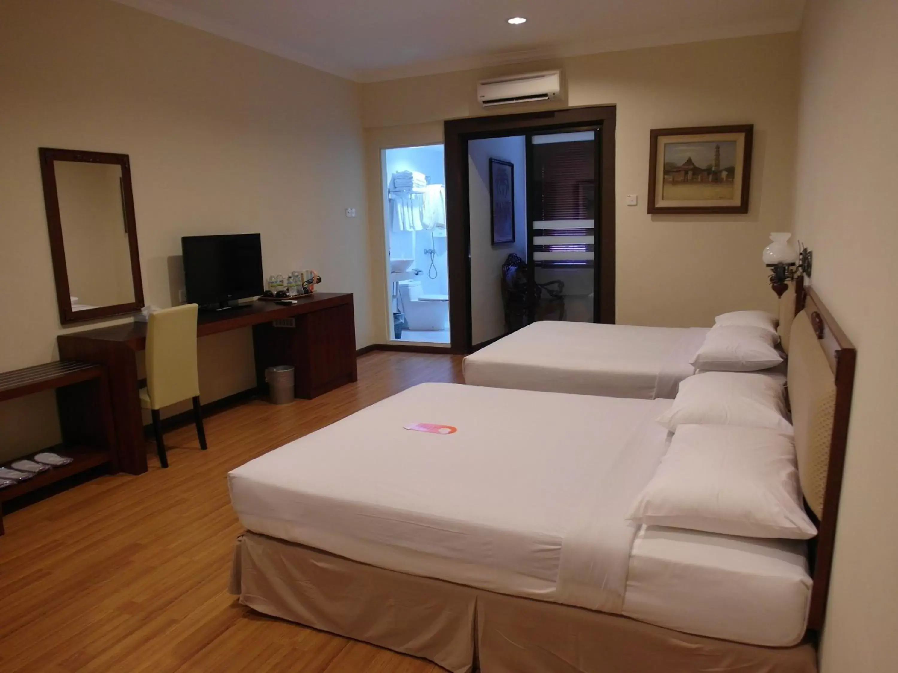 Bedroom in Cheng Ho Hotel