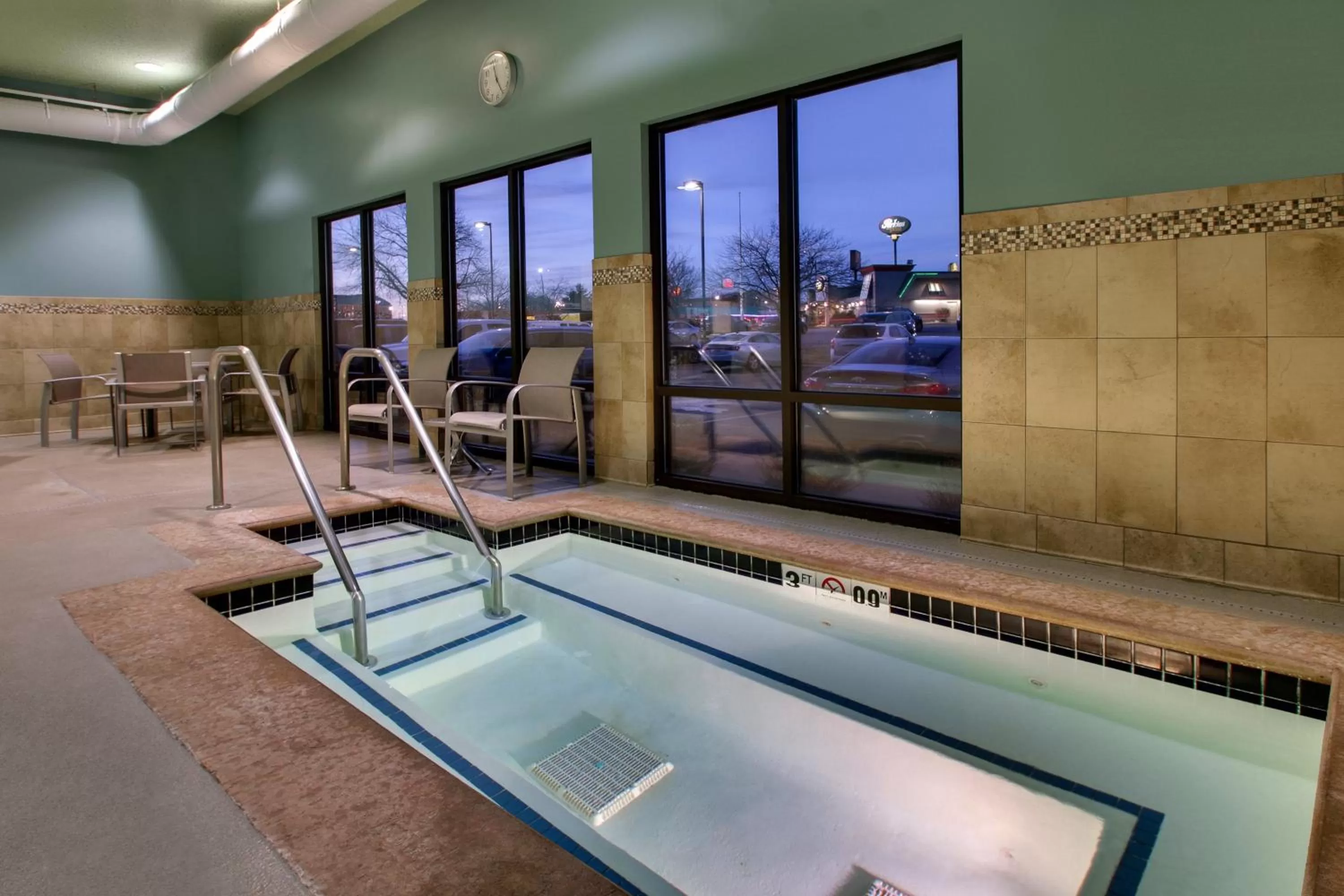 Swimming pool in Holiday Inn Express Hotel & Suites Cedar Rapids I-380 at 33rd Avenue by IHG