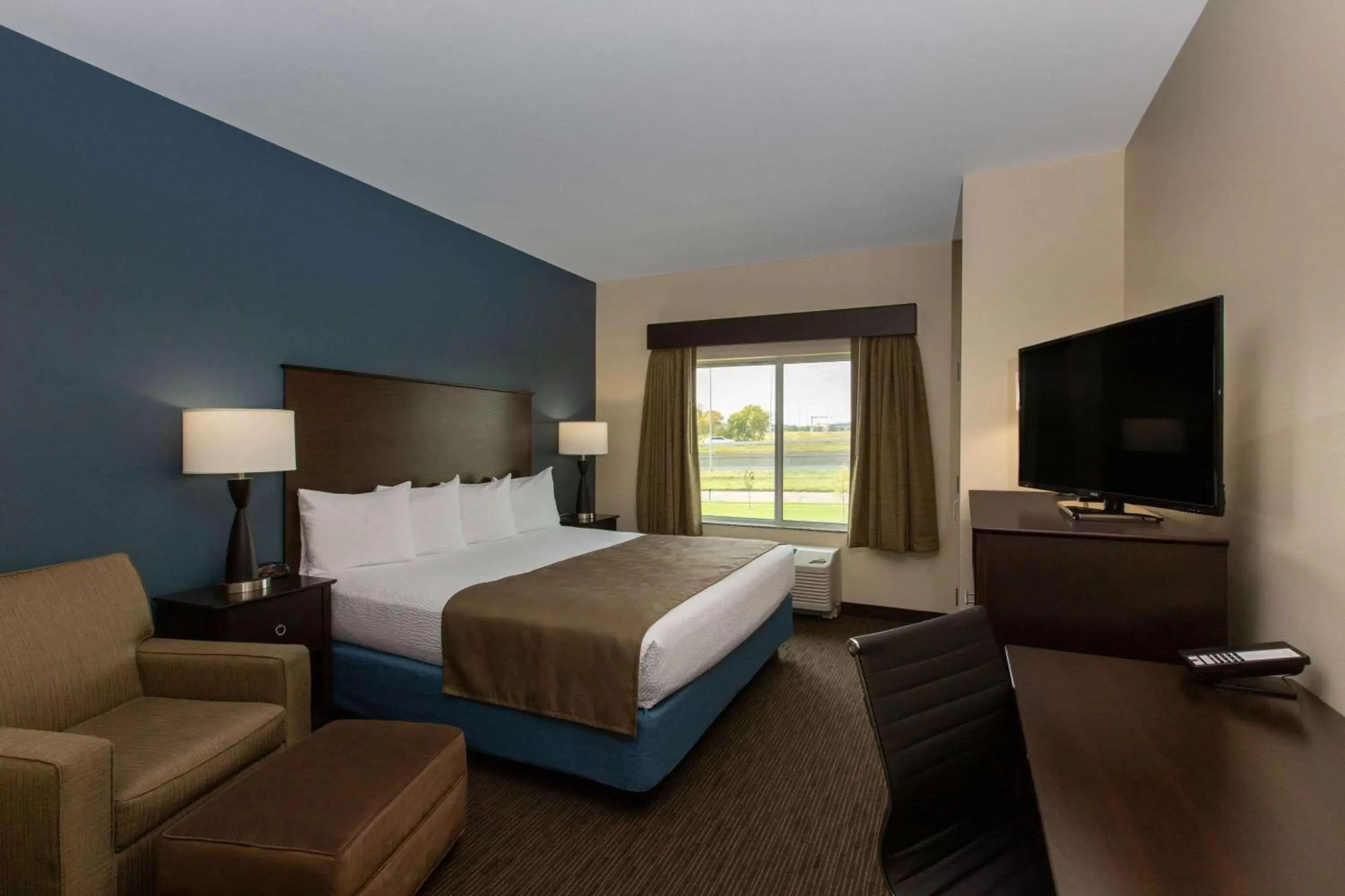 Photo of the whole room, Bed in AmericInn by Wyndham Sioux Falls North