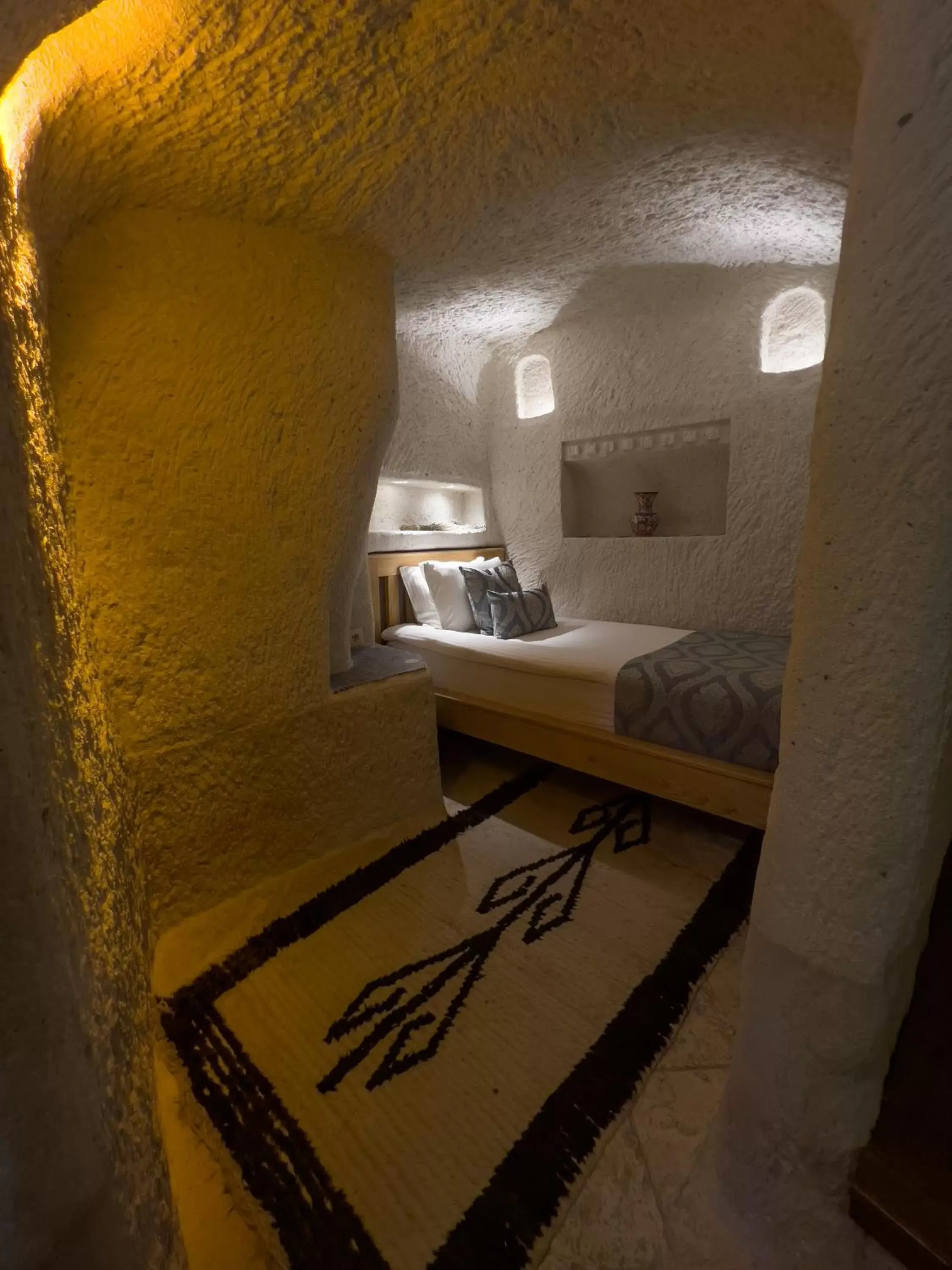 Bed in Local Cave House Hotel