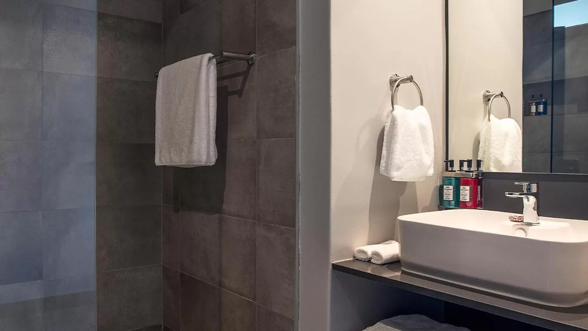 Bathroom in The Catalyst Apartment Hotel by NEWMARK