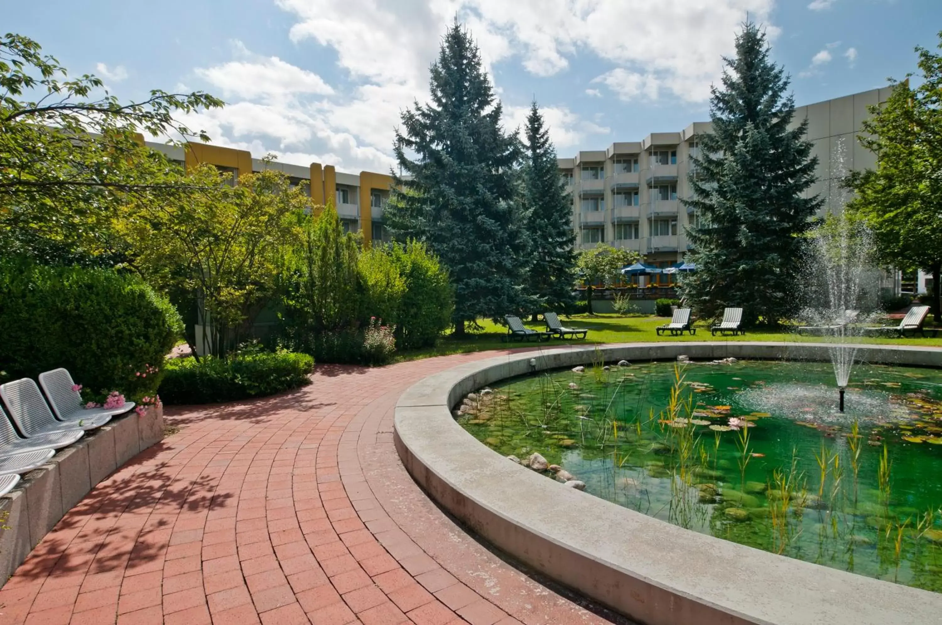 Lobby or reception in Holiday Inn Munich - South by IHG Lobby or reception in Holiday Inn Munich - South by IHG