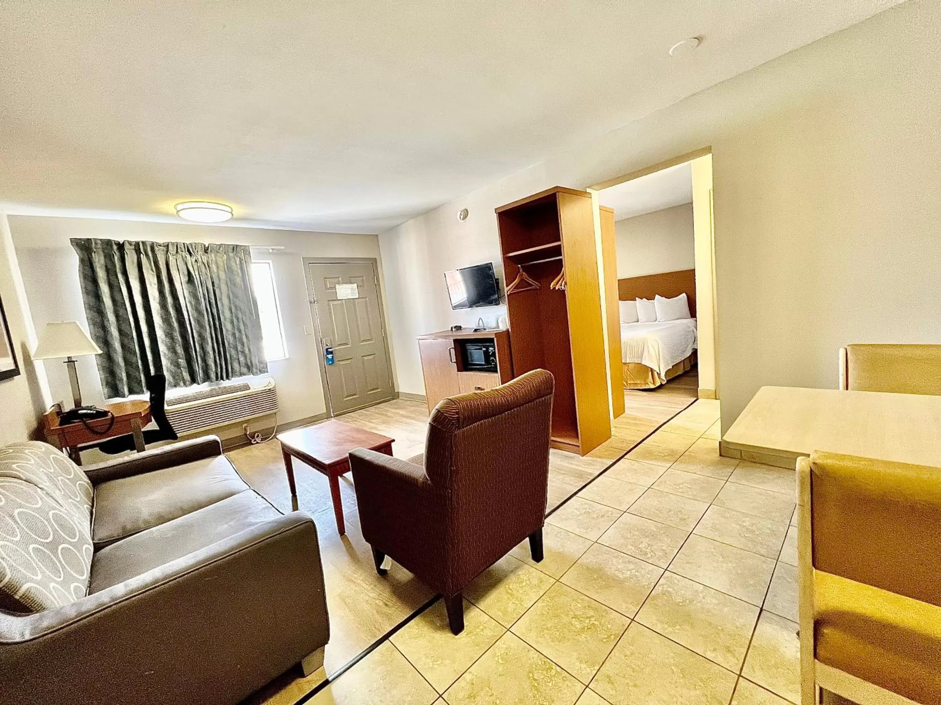 Photo of the whole room in Days Inn & Suites by Wyndham Arlington Near Six Flags Photo of the whole room in Days Inn & Suites by Wyndham Arlington Near Six Flags