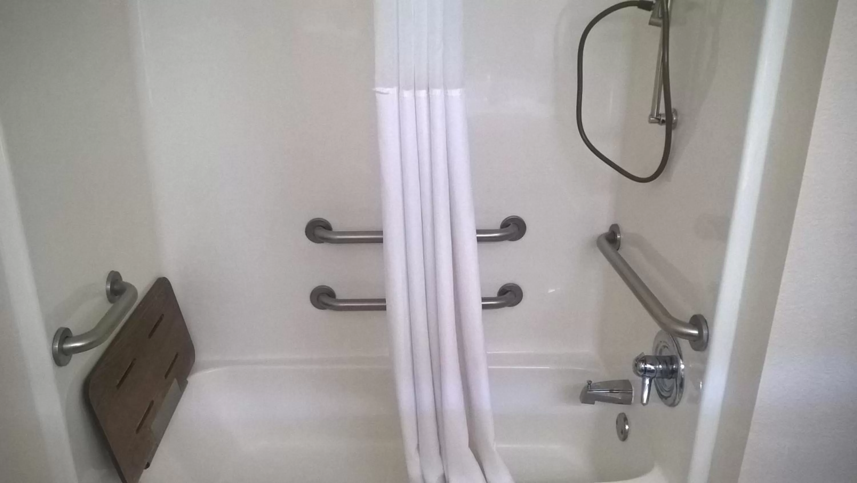 Bathroom in Days Inn & Suites by Wyndham Hutchinson