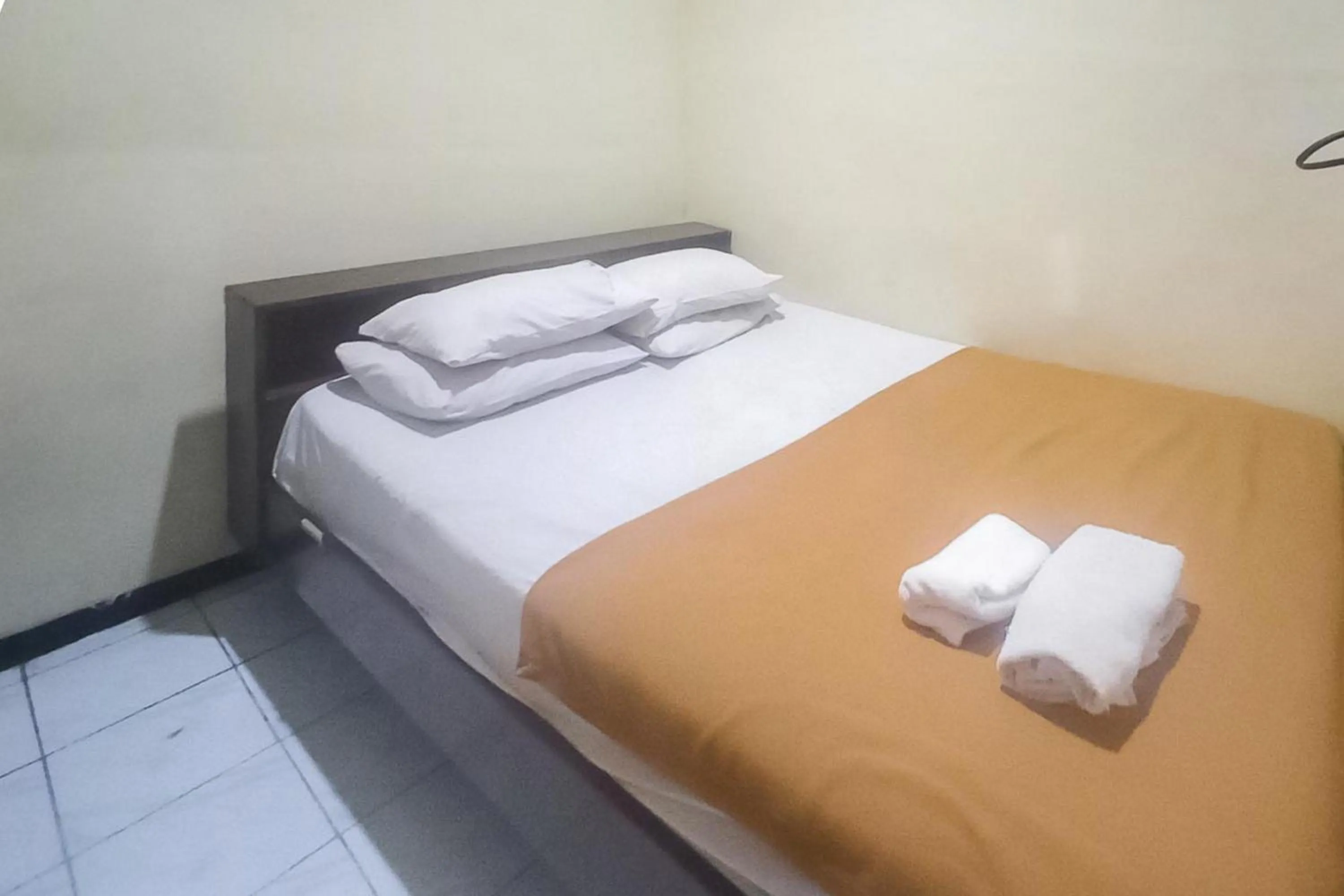 Bed in Hotel Malang near Alun Alun Malang RedPartner