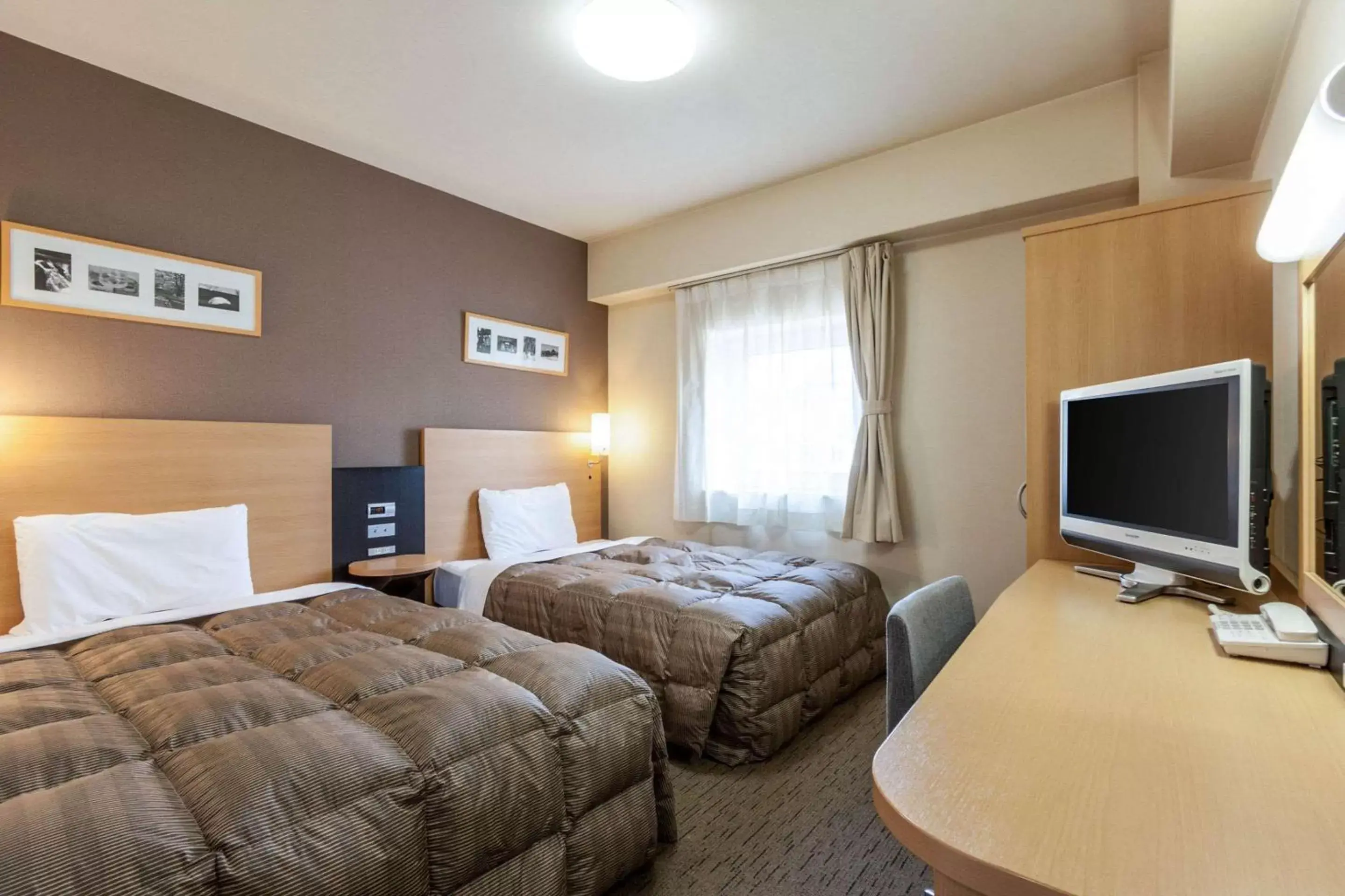 Photo of the whole room, Bed in Comfort Hotel Obihiro