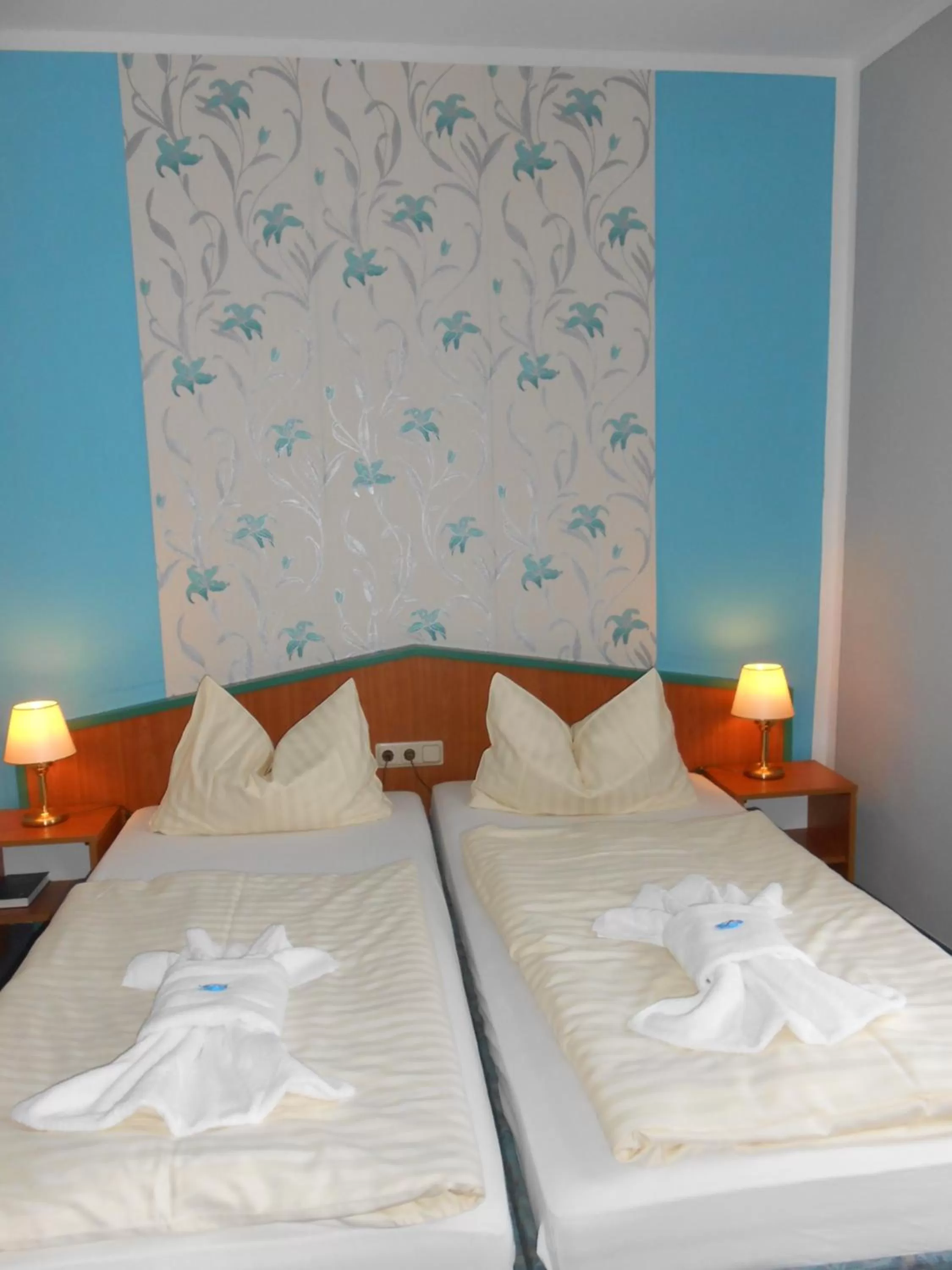 Bed in GreenLine Ferienhotel Forelle