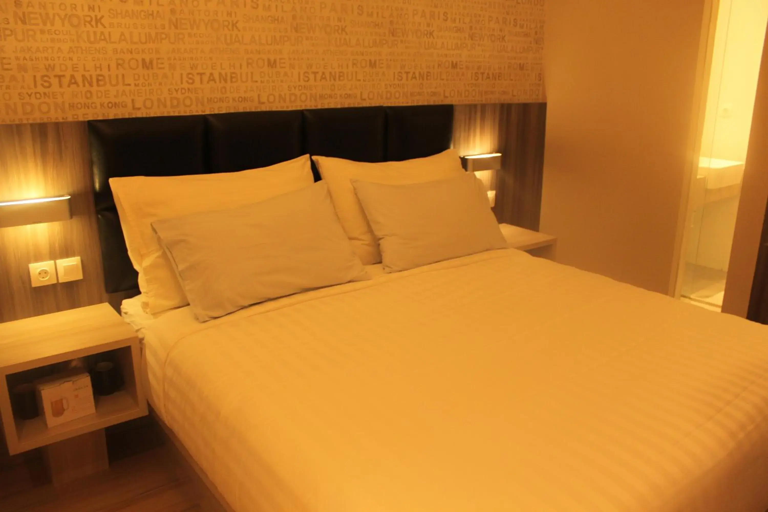 Bedroom, Bed in Luminor Hotel Jambi Kebun Jeruk By WH