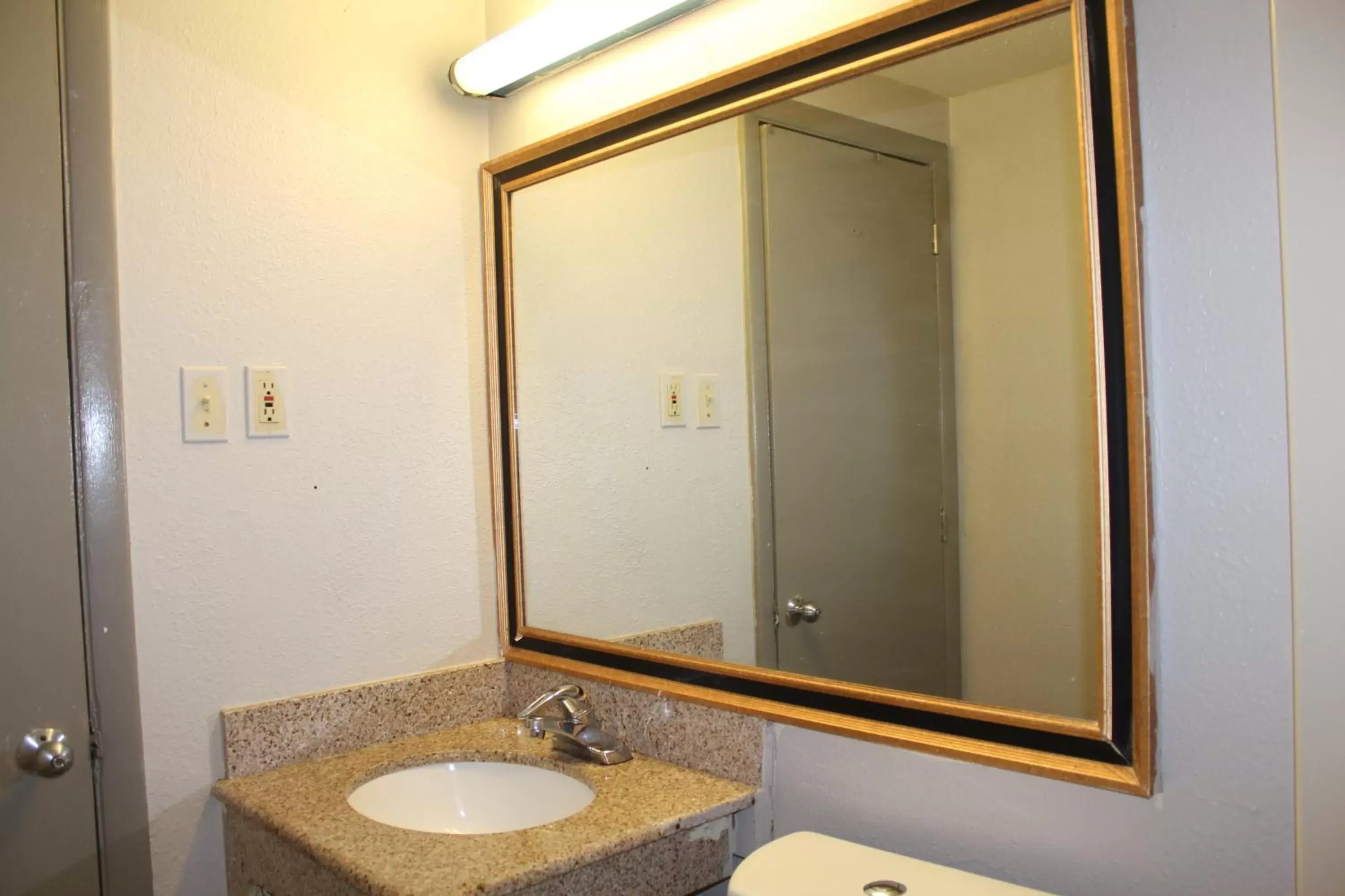 Bathroom in Days Inn by Wyndham Wrightstown