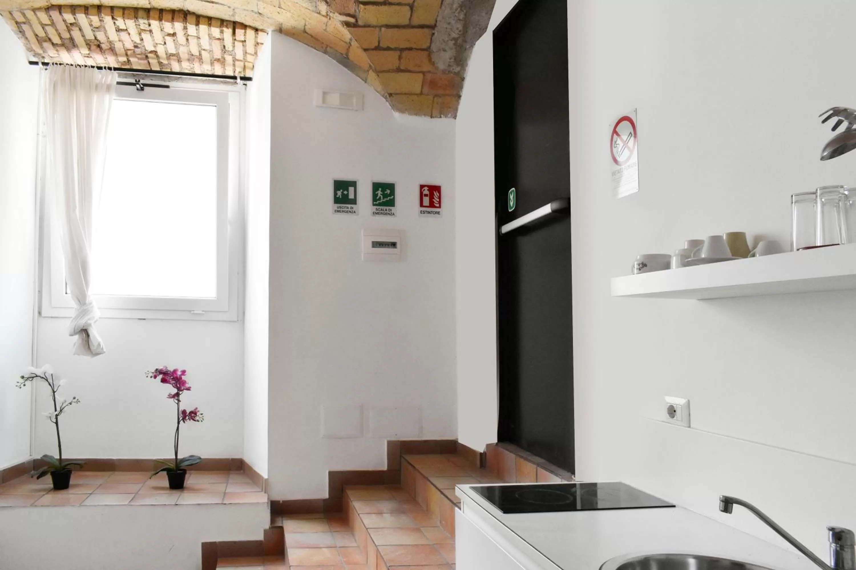 Kitchen or kitchenette in Roma Resort Colosseum