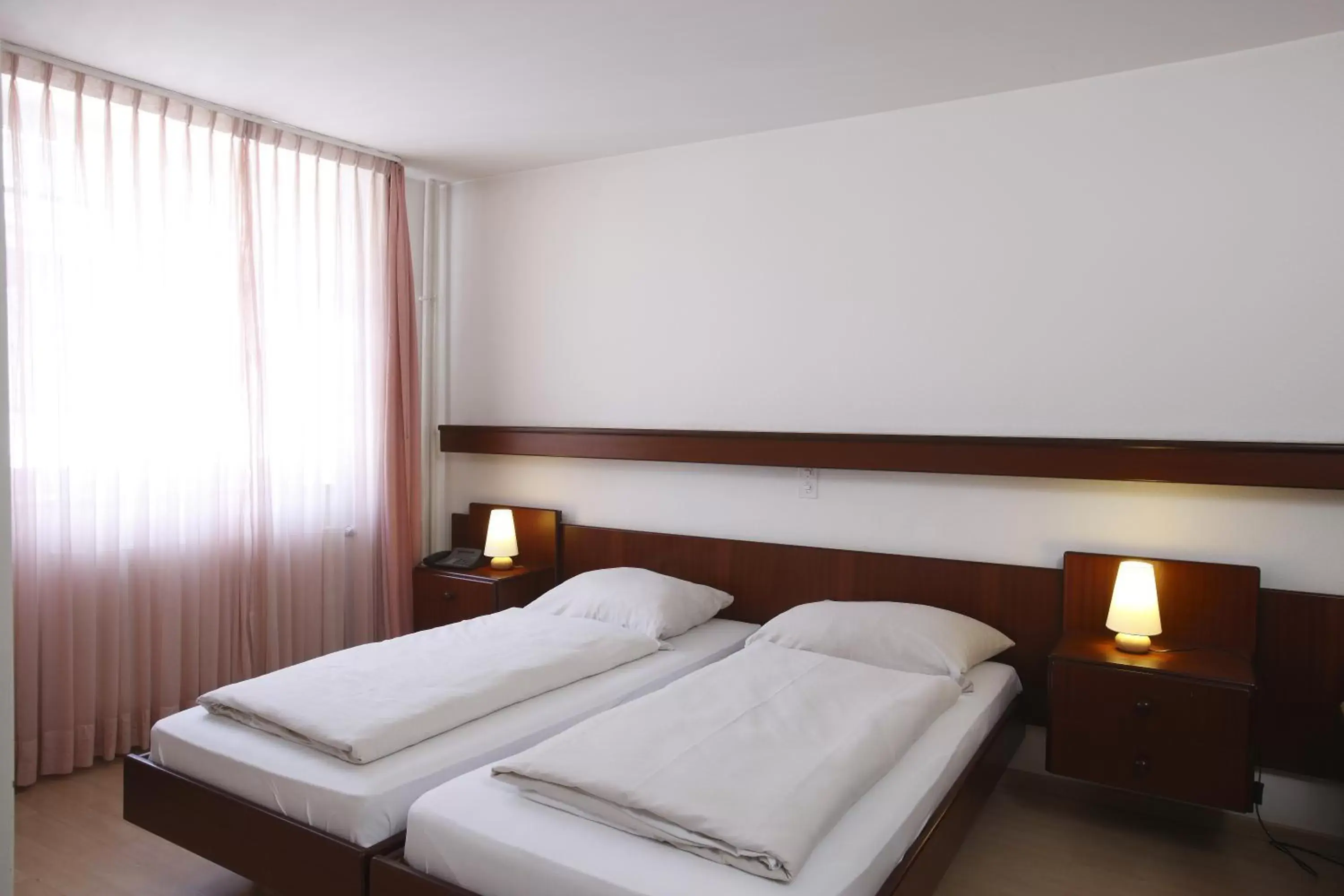 Bedroom, Bed in Spalenbrunnen Hotel & Restaurant Basel City Center
