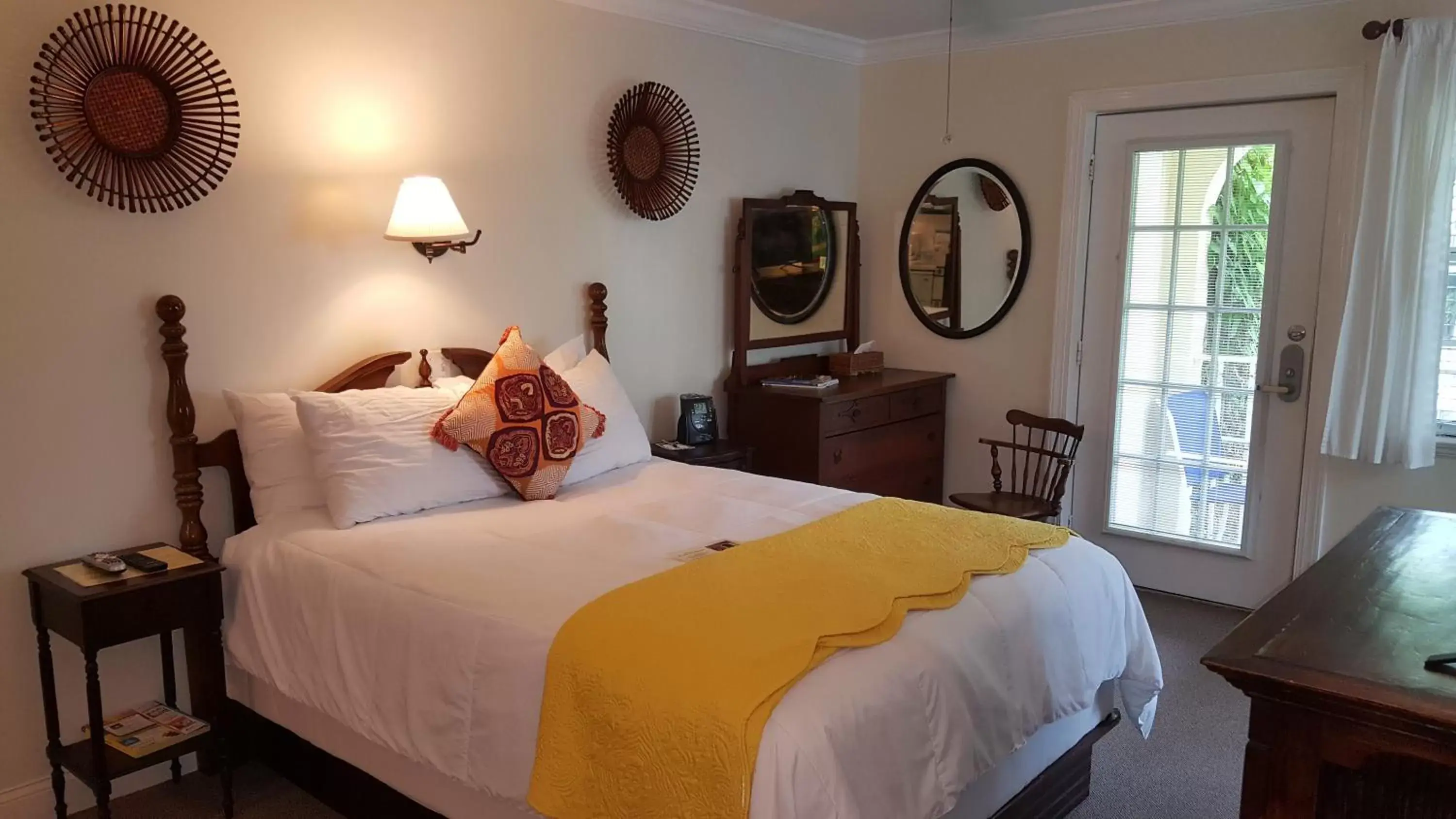 Photo of the whole room, Bed in The Caribbean Court Boutique Hotel