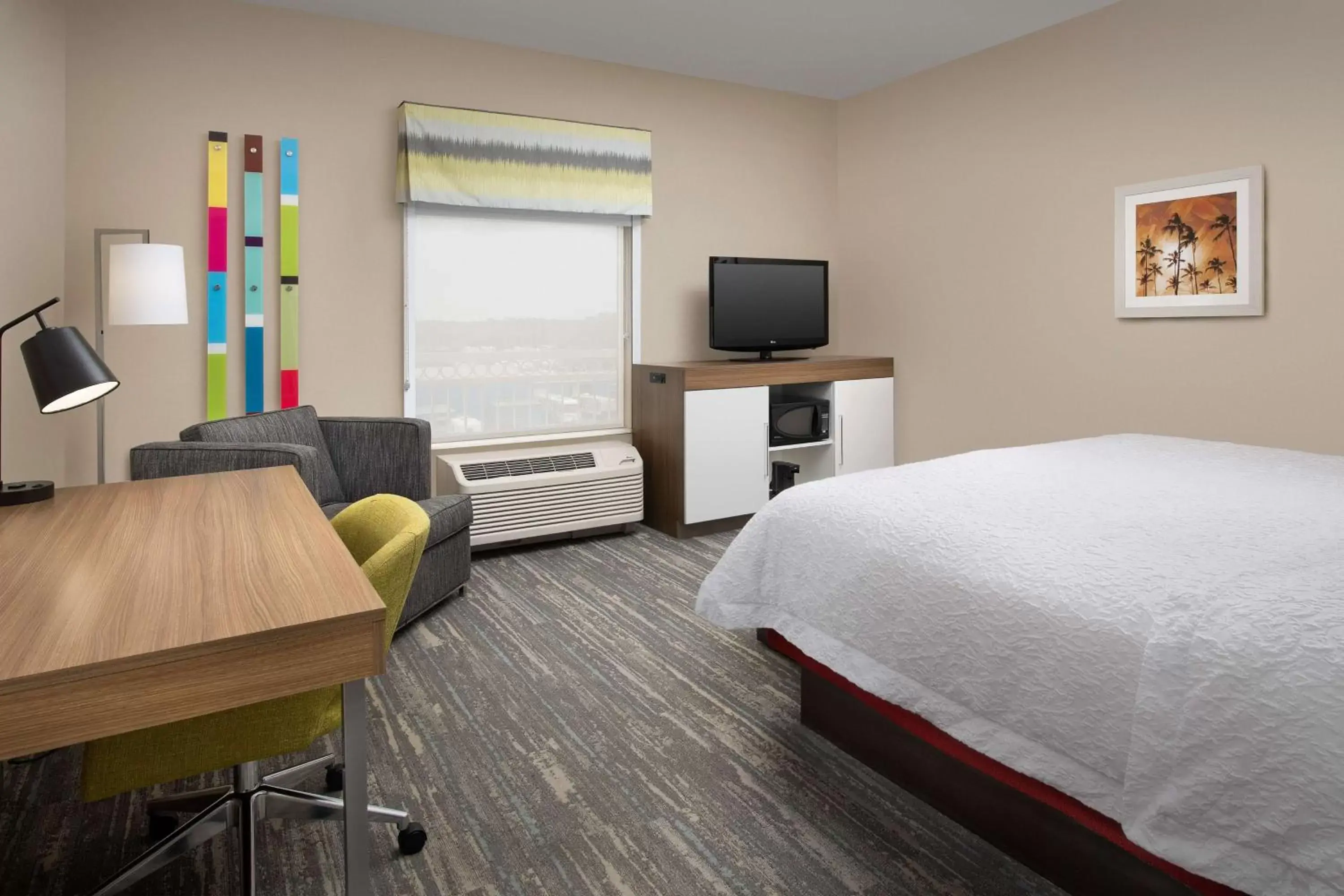 Bedroom, TV/Entertainment Center in Hampton Inn & Suites Lake City