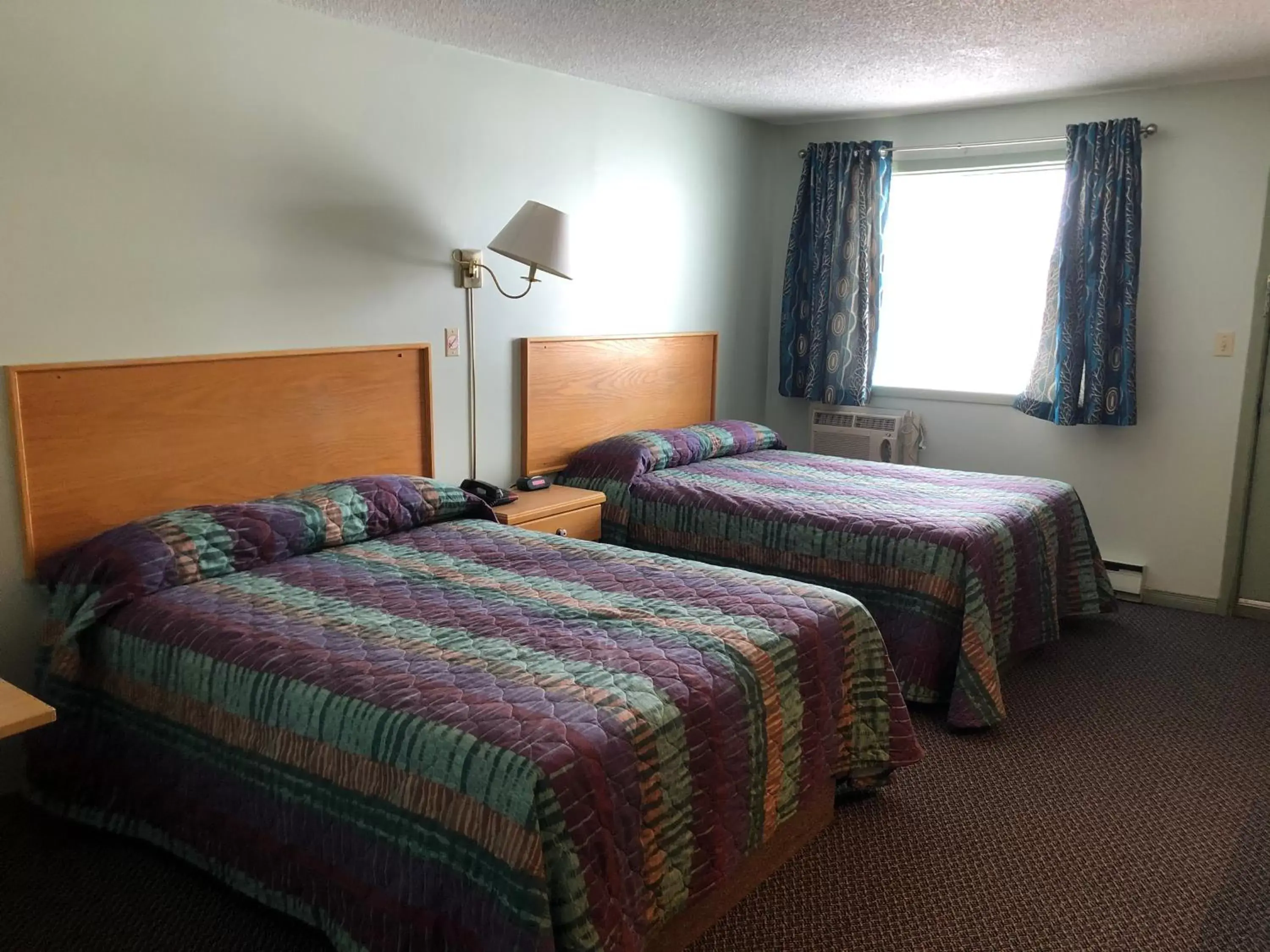 Bed in Chimo Motel