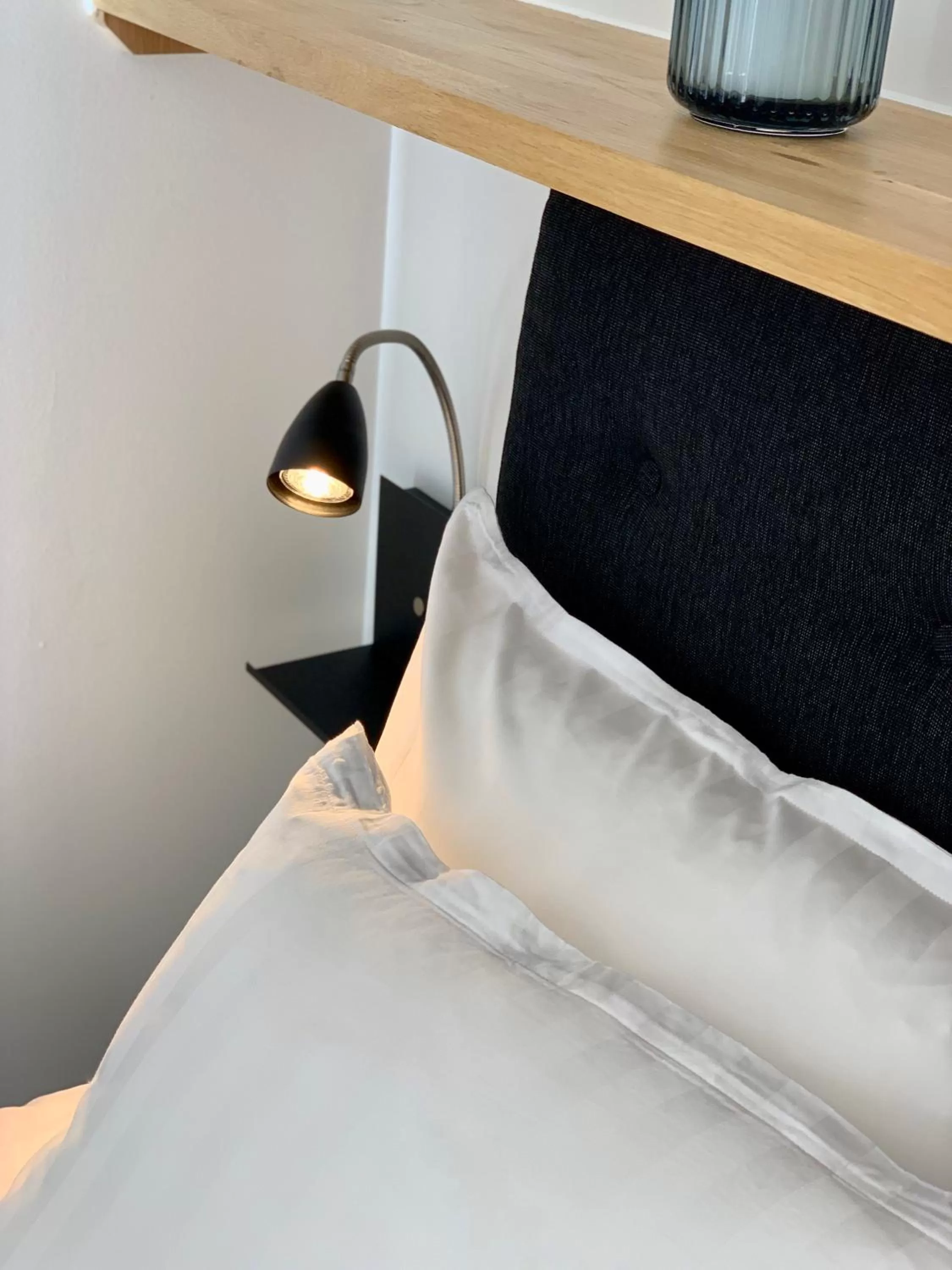 Bed in Easy Livin' Apartment Hotel