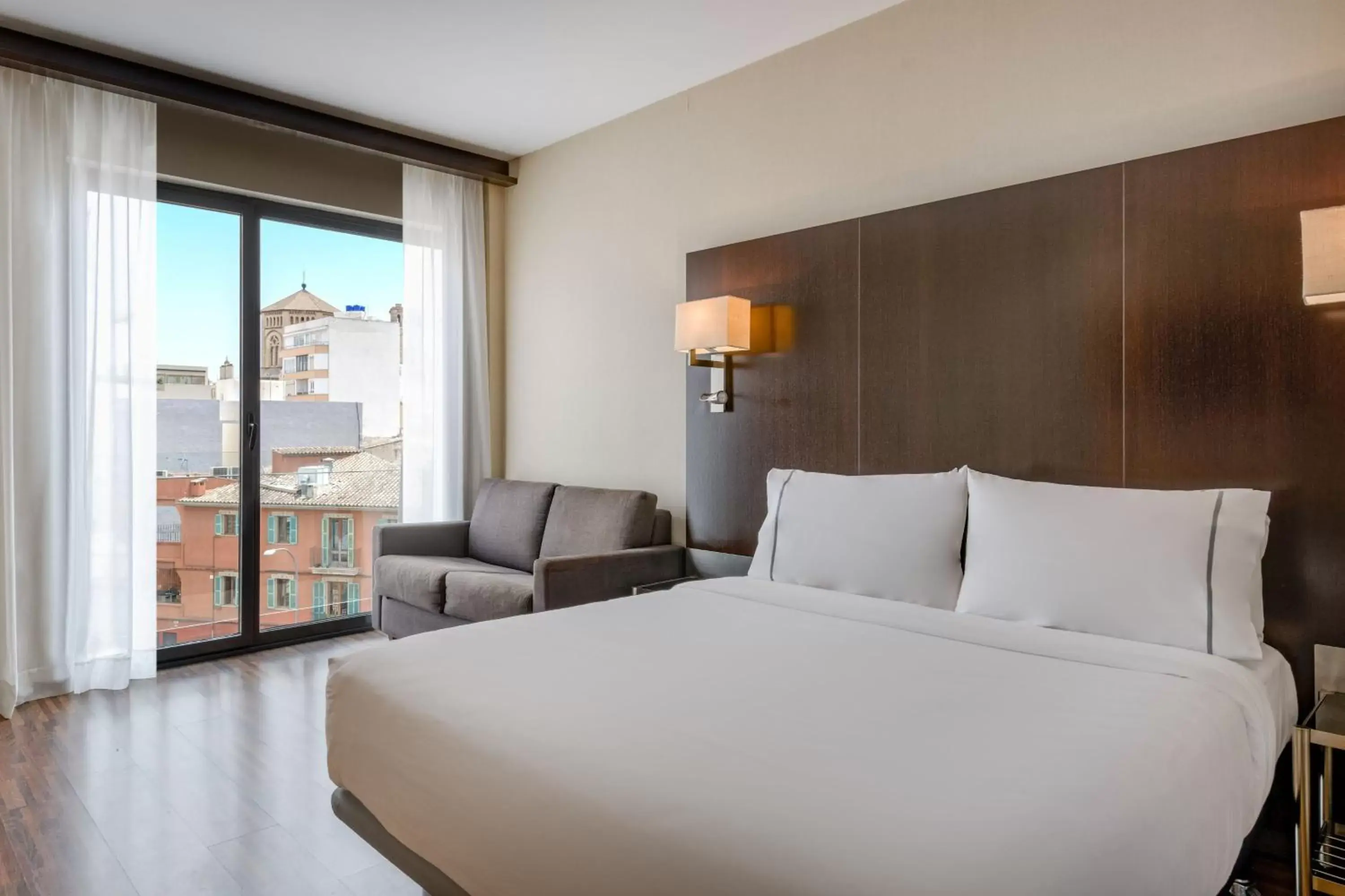 Photo of the whole room, Bed in AC Hotel Ciutat de Palma by Marriott