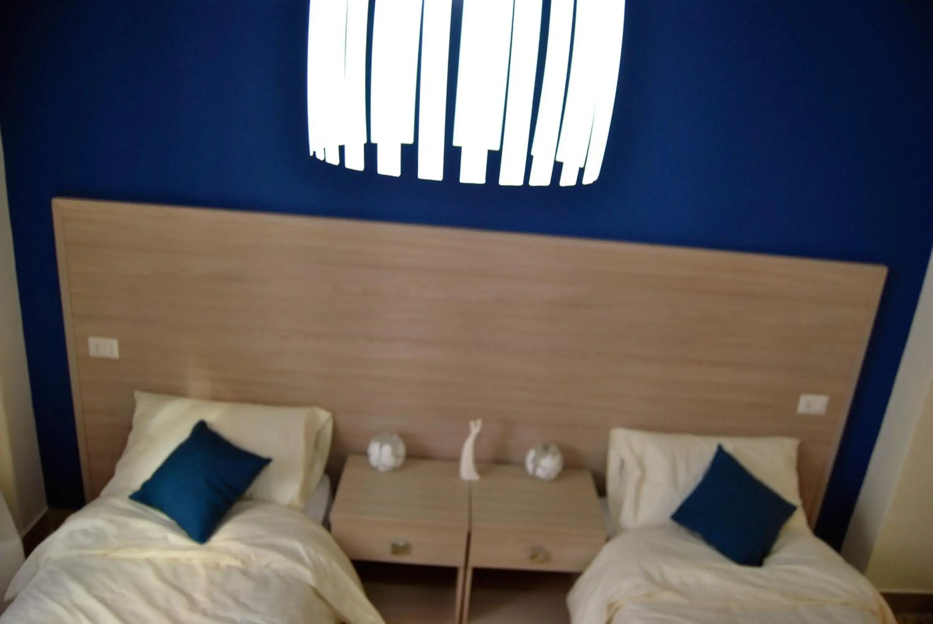 Bed in Il Quadrifoglio Room& Suite