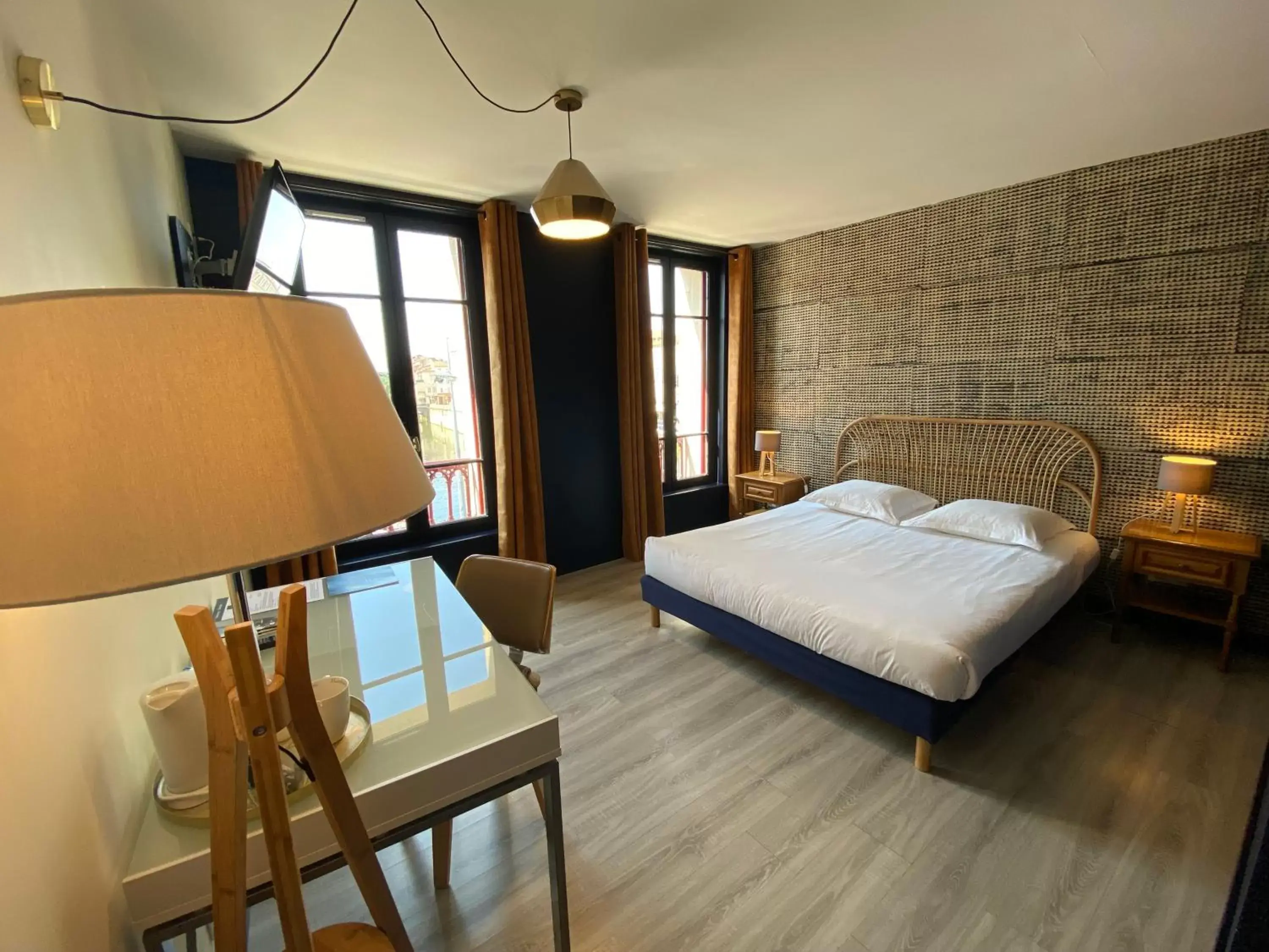 Bedroom in Le Miredames Hôtel-Bar