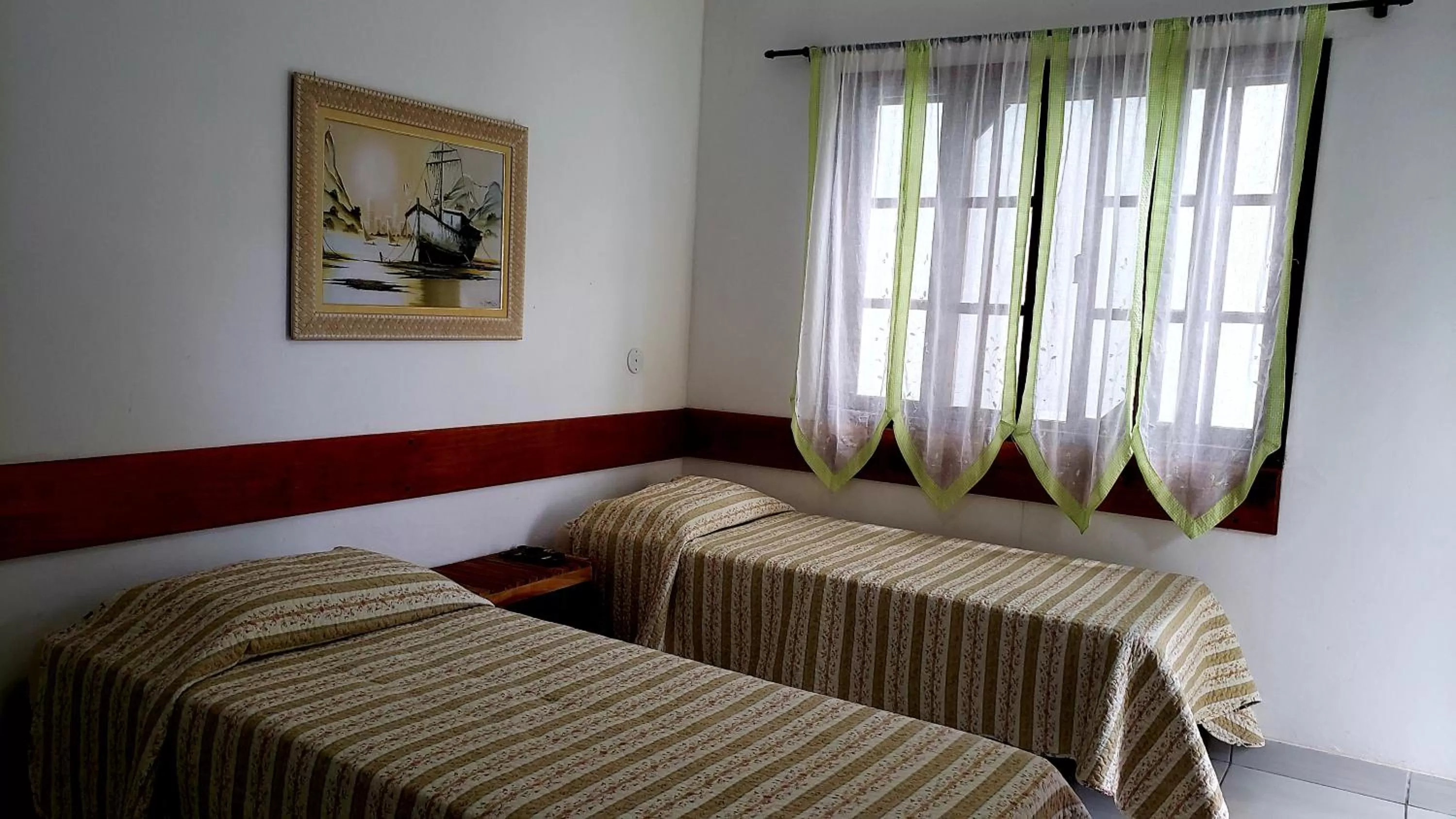 Bed in Pousada Recanto Das Emerências