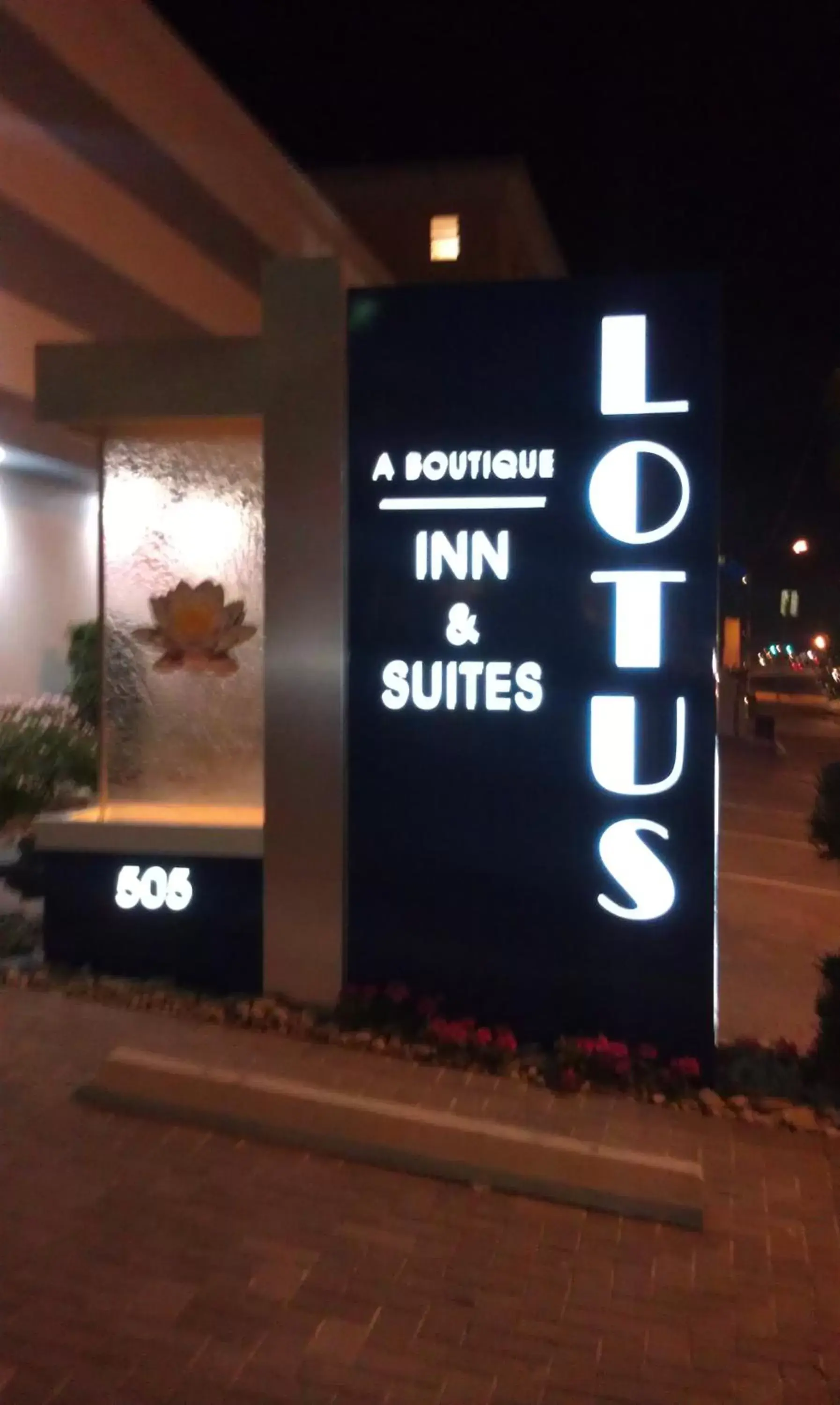 Property logo or sign in Lotus Boutique Inn and Suites